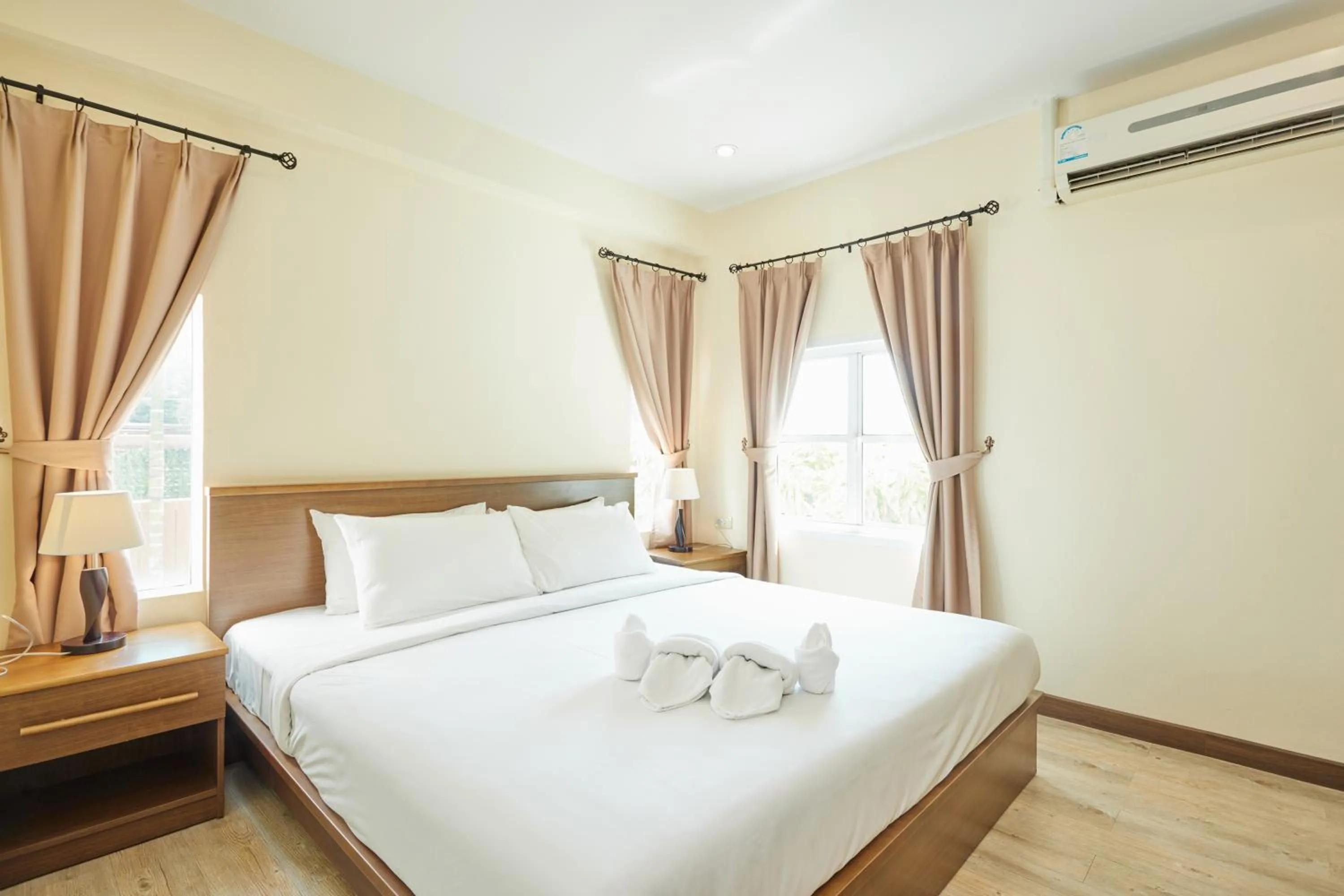 Bed in Talay Hotel and Villa Cha-am