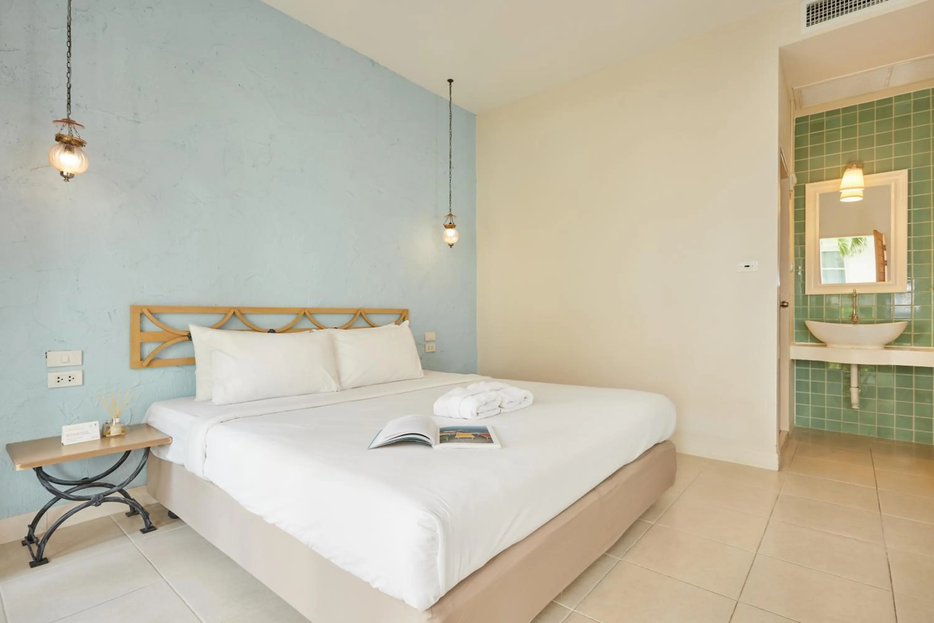 Bed in Talay Hotel and Villa Cha-am