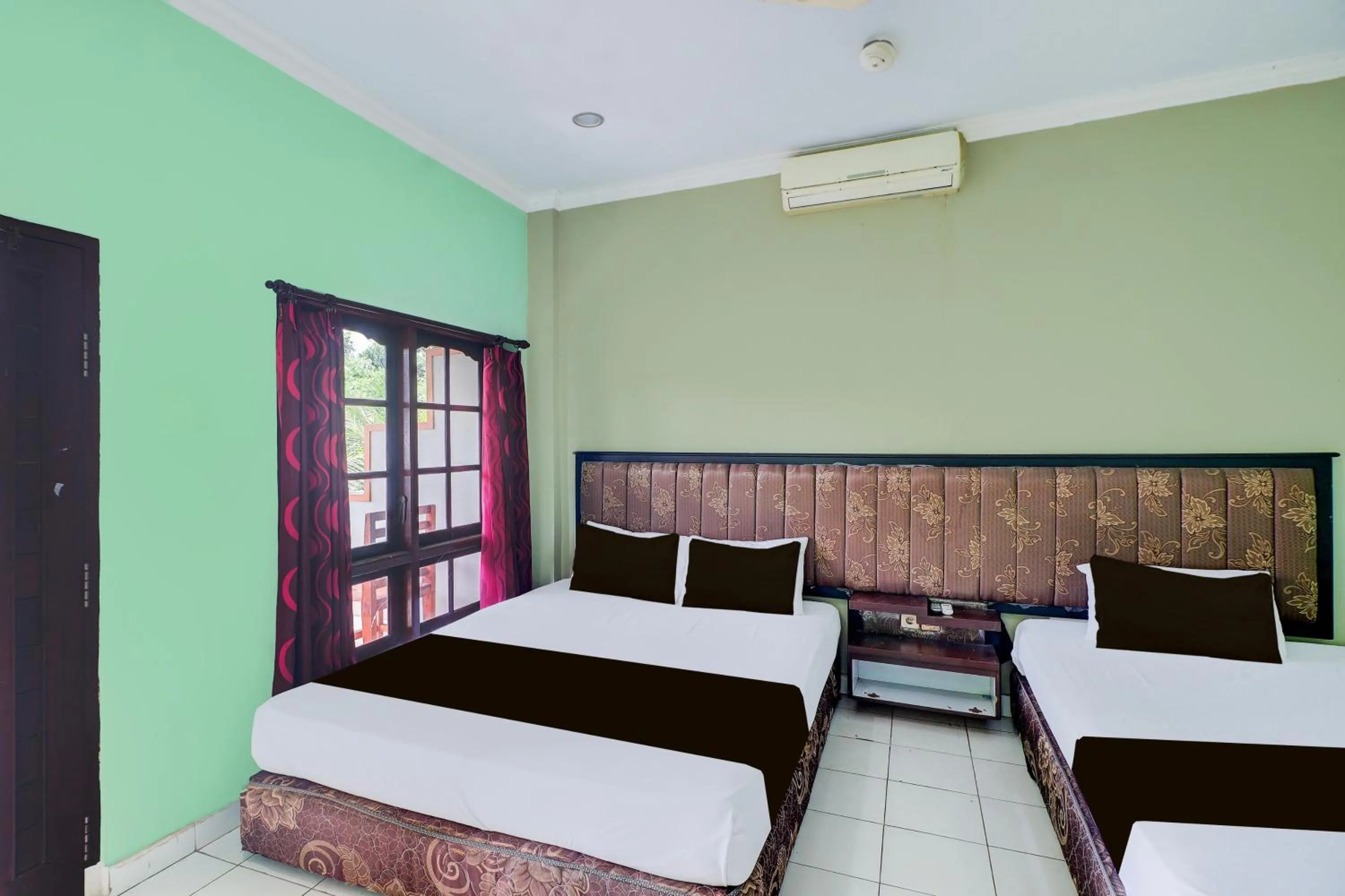 Bedroom, Bed in Collection O Bali near Terminal Ubung formerly Batukaru Garden Hotel