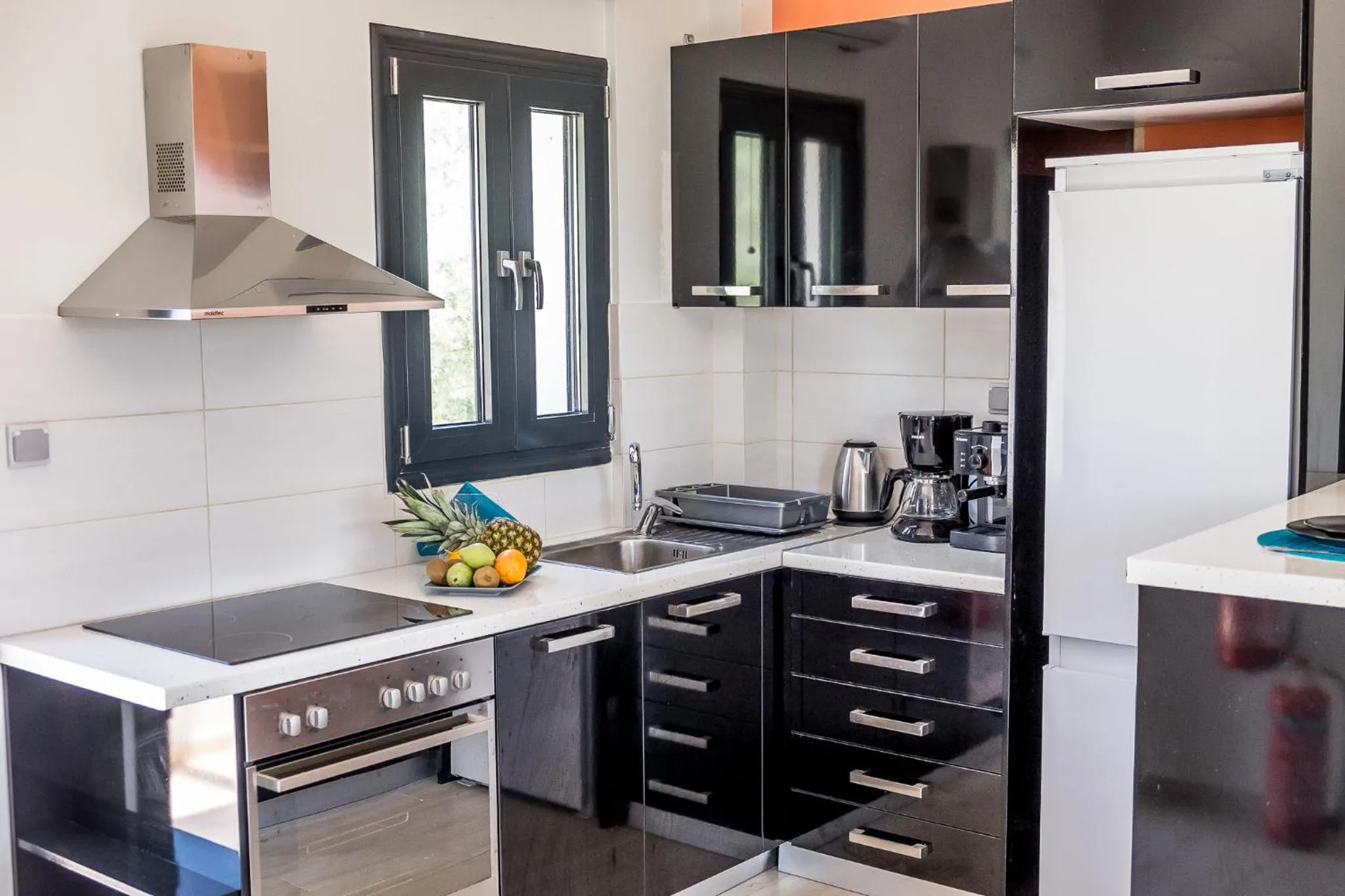 Kitchen or kitchenette in Golden Sun Villas