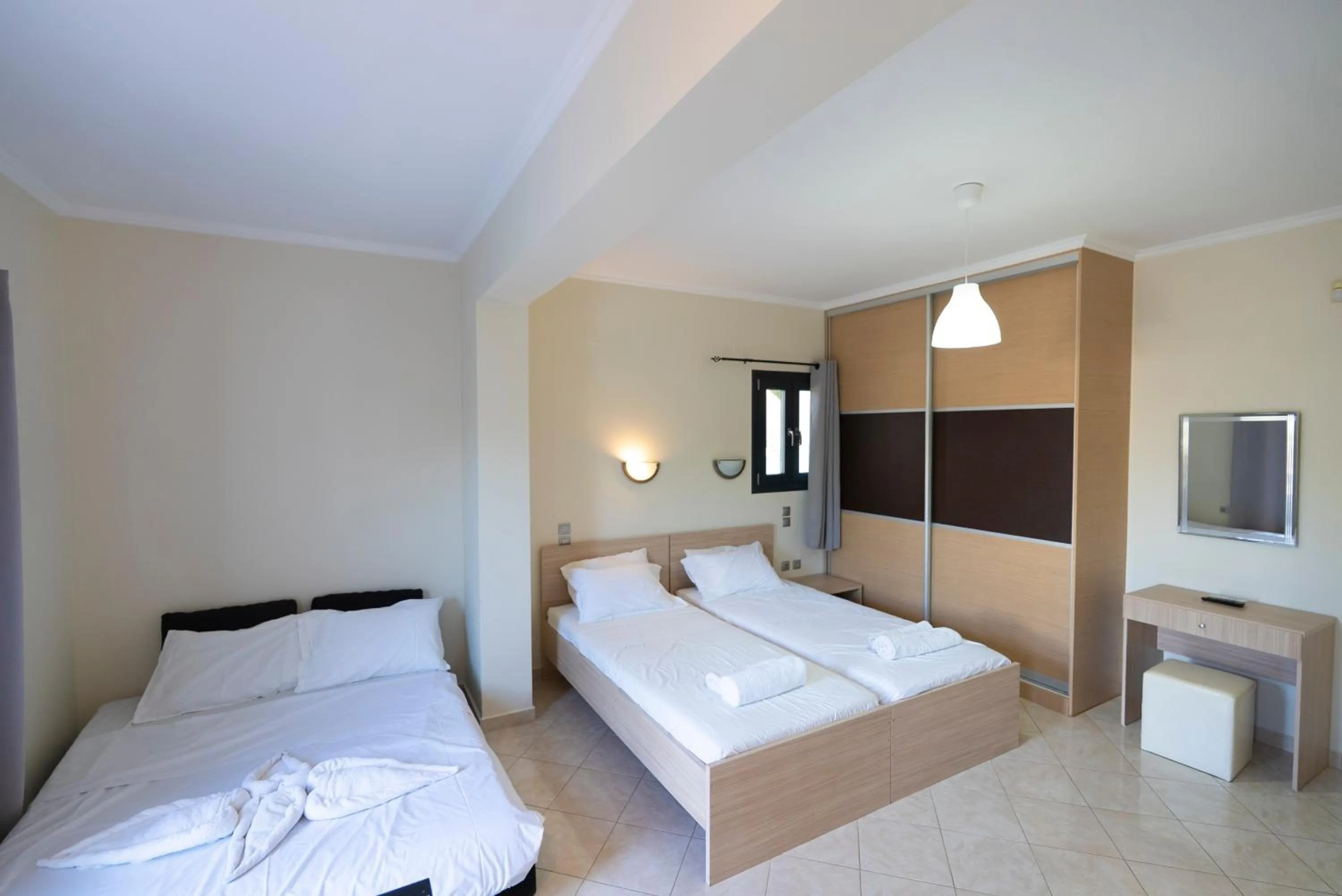 Bed in Golden Sun Villas