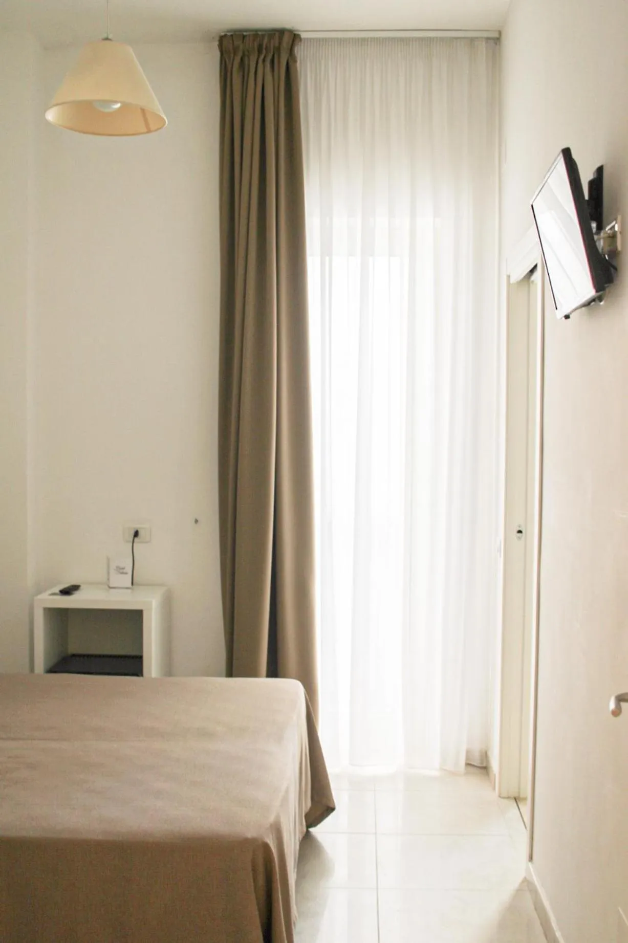 Bed in Hotel Falcone