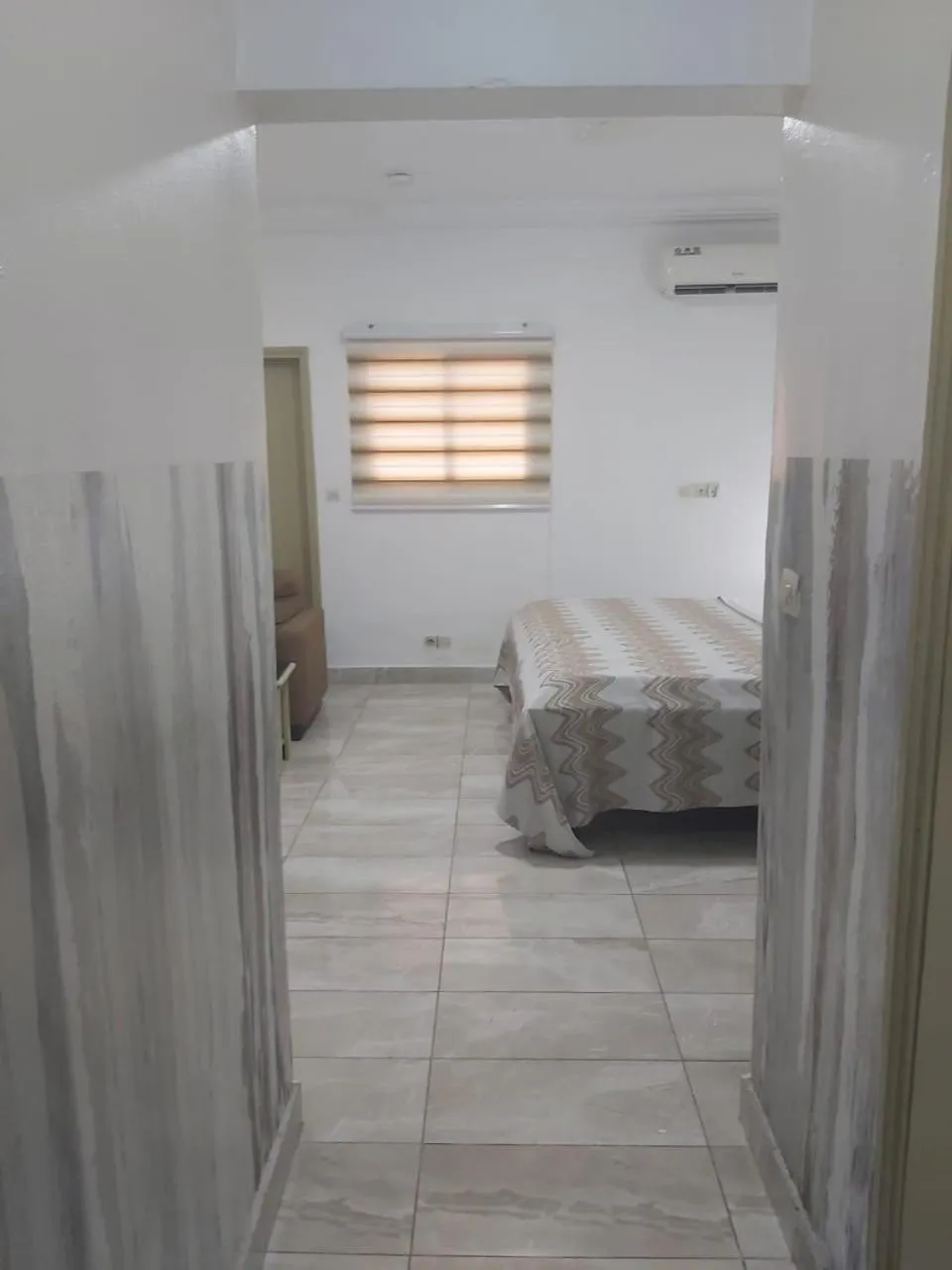 Bed in Hotel Carmel Cocody