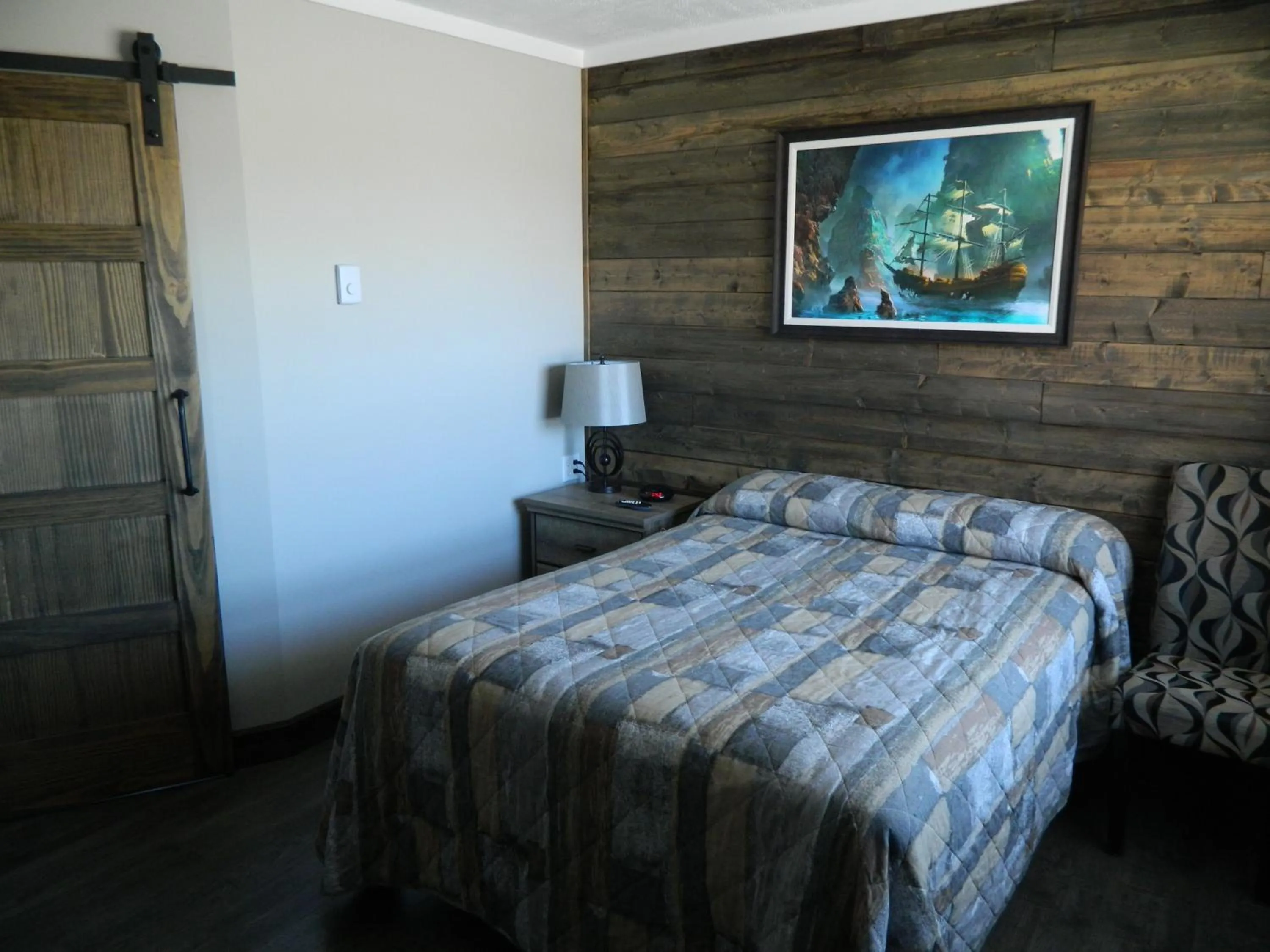 Bed in Le Pirate Motel et Camping