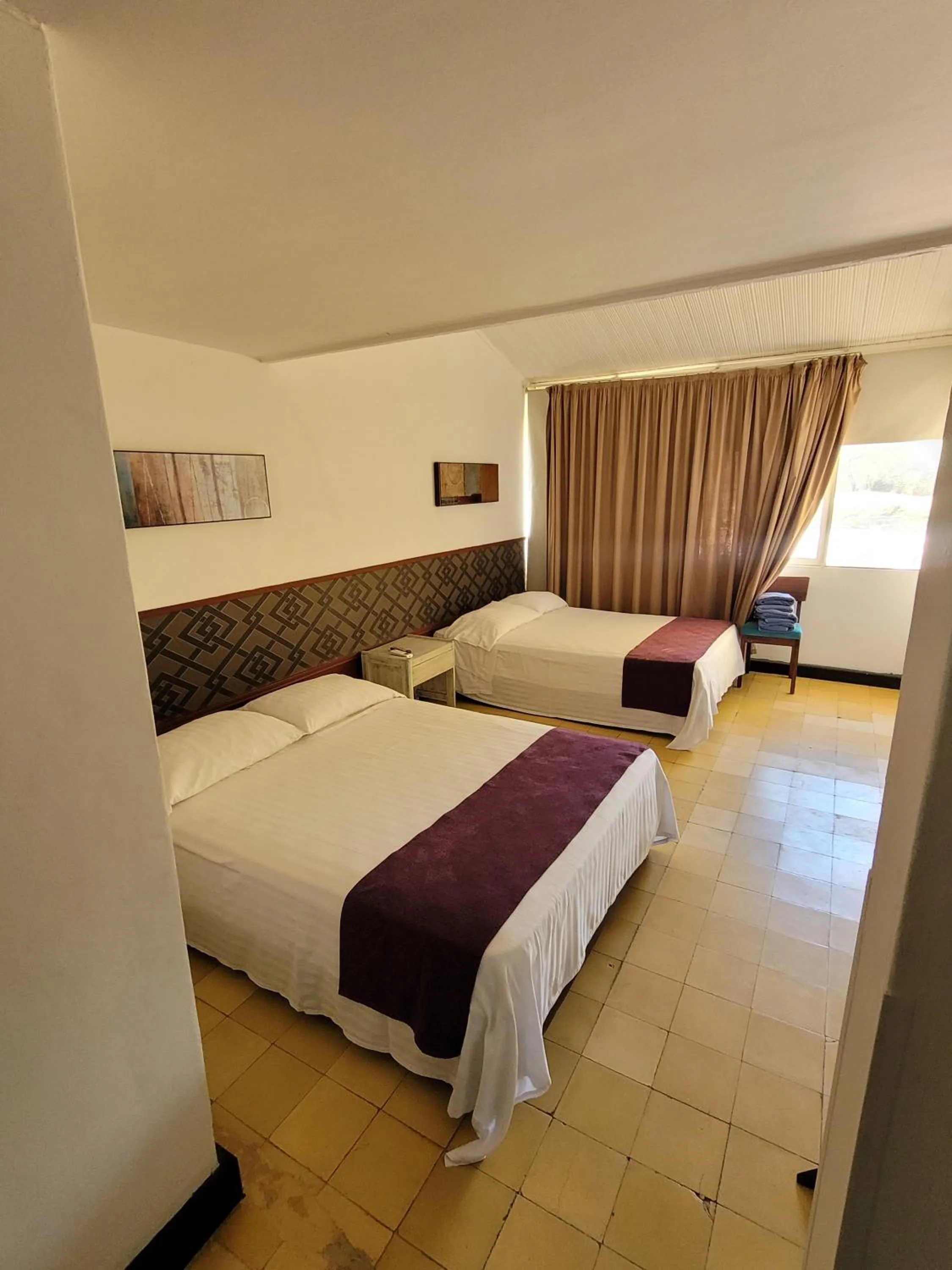 Bed in Hotel Gimaura