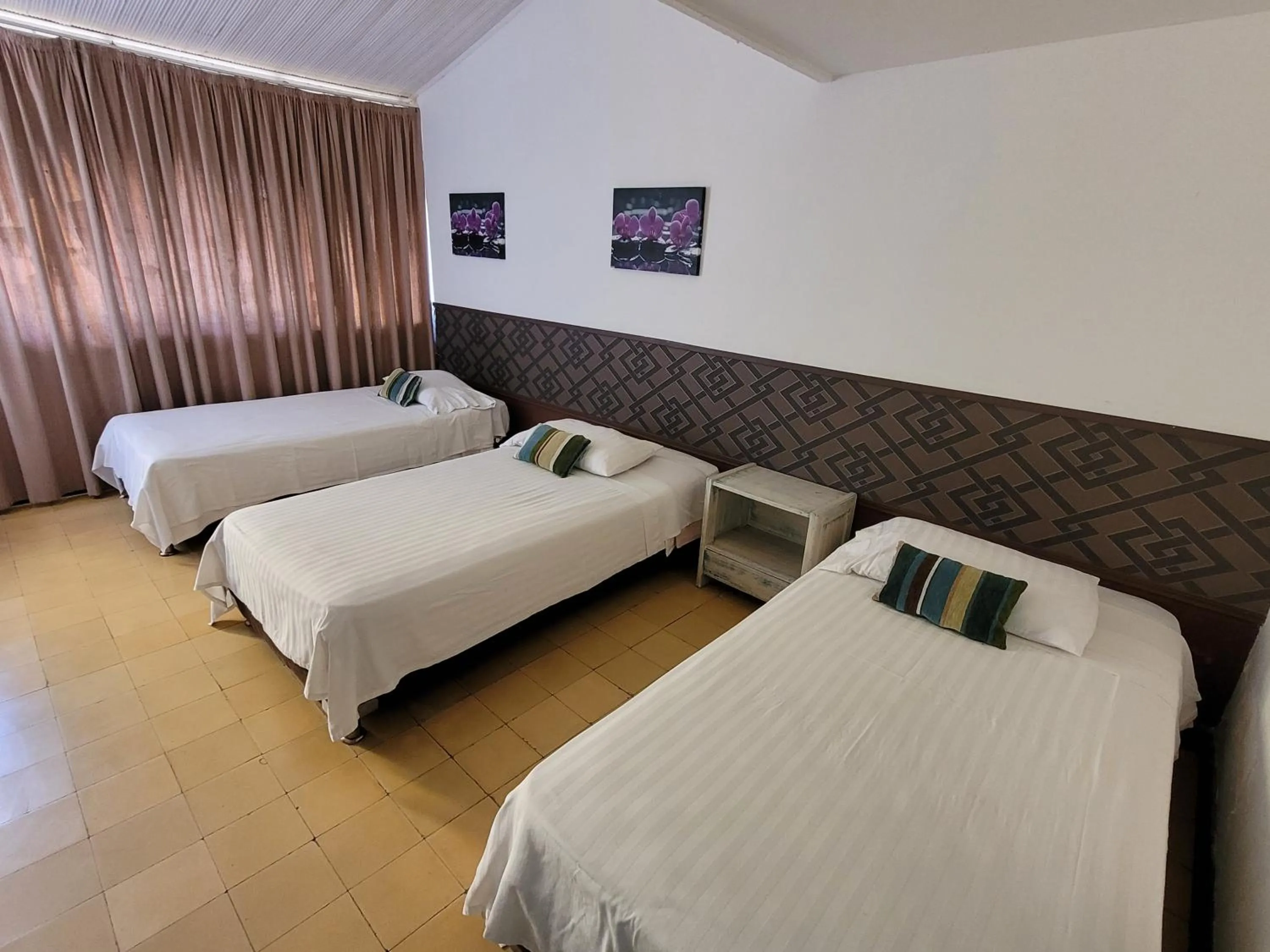 Bed in Hotel Gimaura