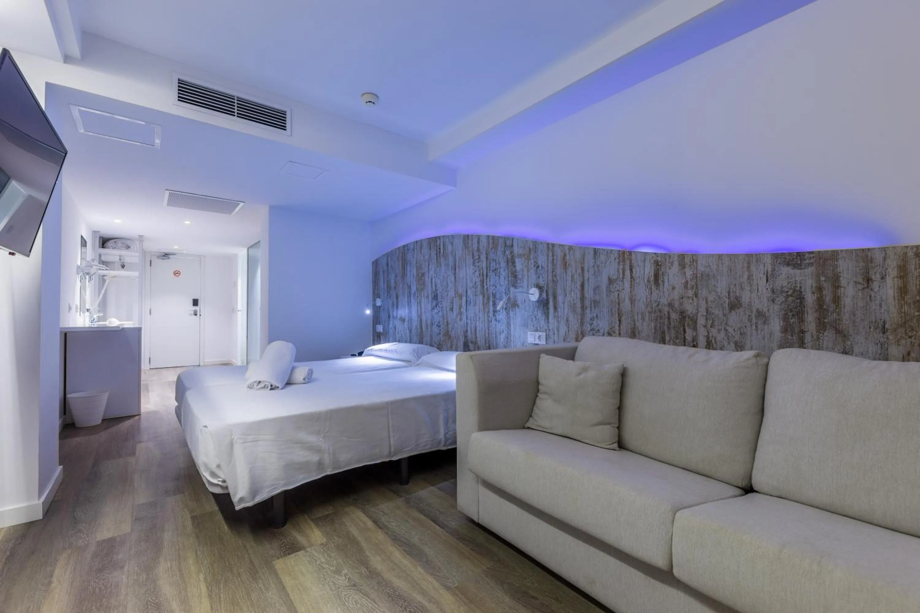 Photo of the whole room, Bed in Welikehotel Triton Beach