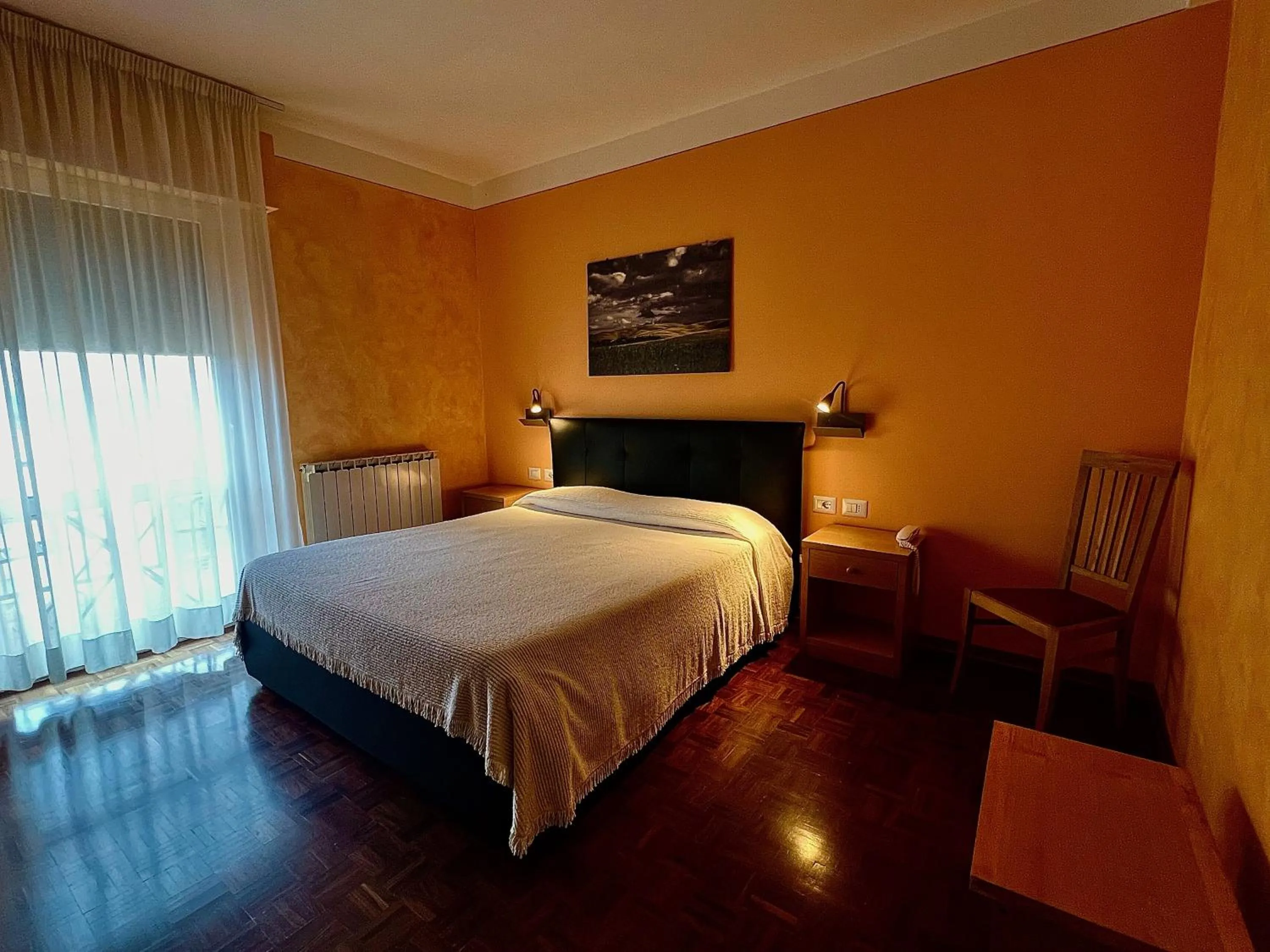 Photo of the whole room, Bed in Albergo Di Murlo