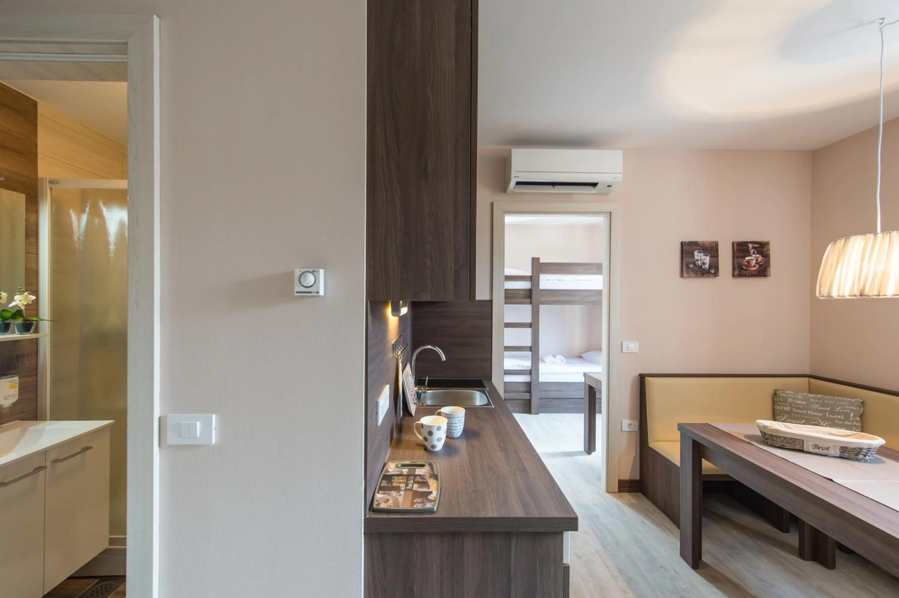 Kitchen or kitchenette, Bed in Hotel Pri mostu