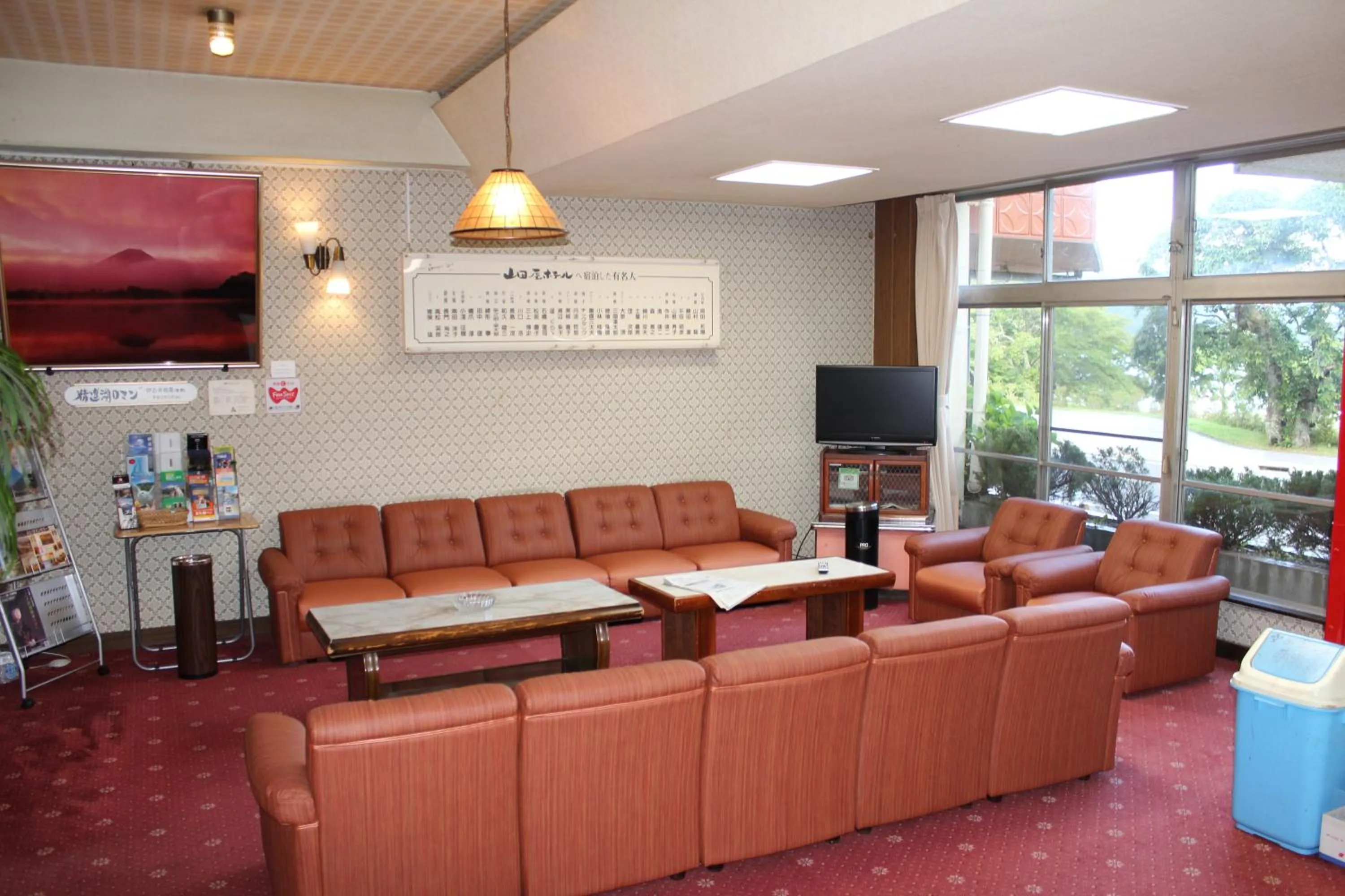 Communal lounge/ TV room in Yamadaya Hotel