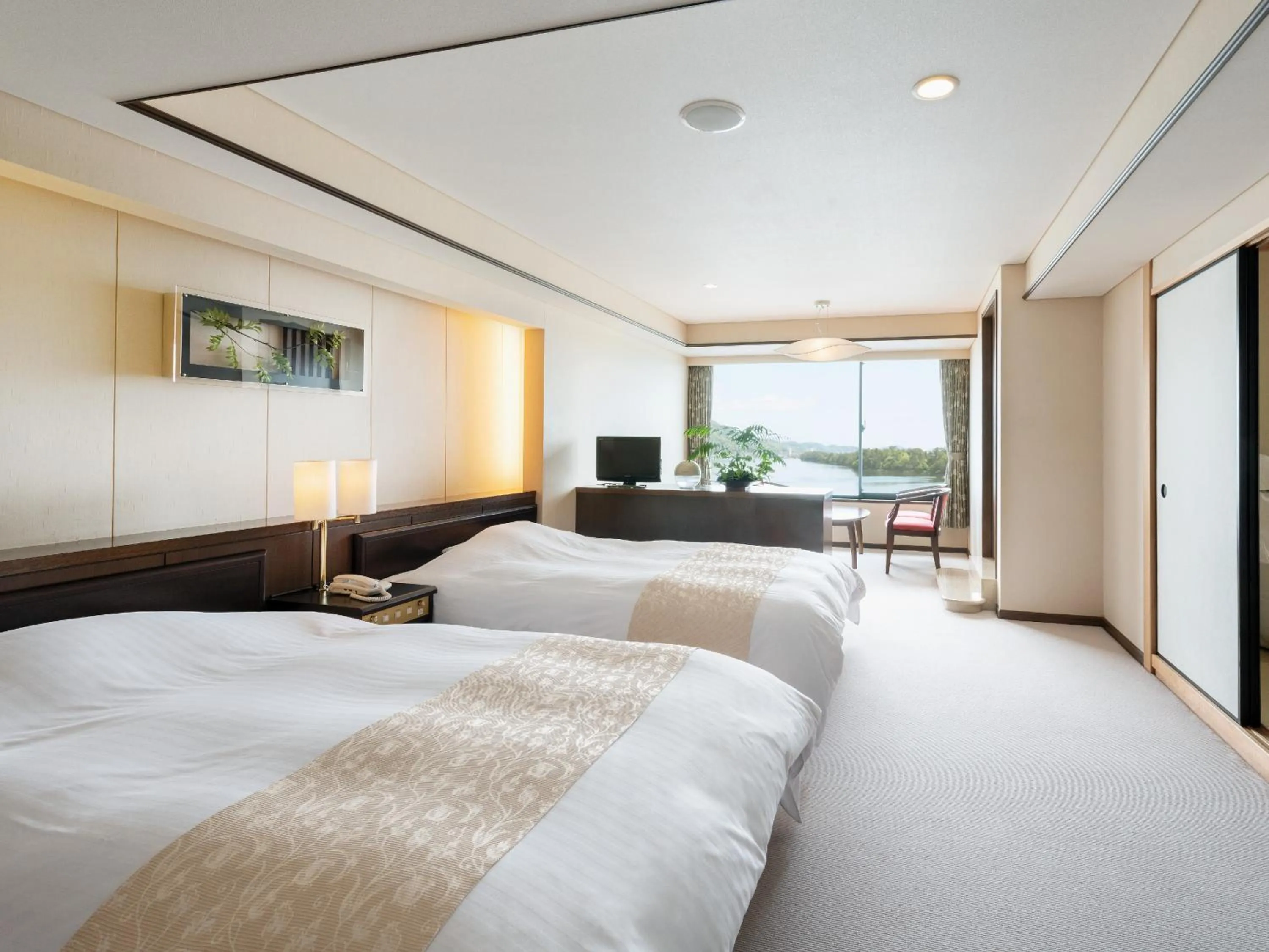 Photo of the whole room, Bed in Amano Hashidate Hotel