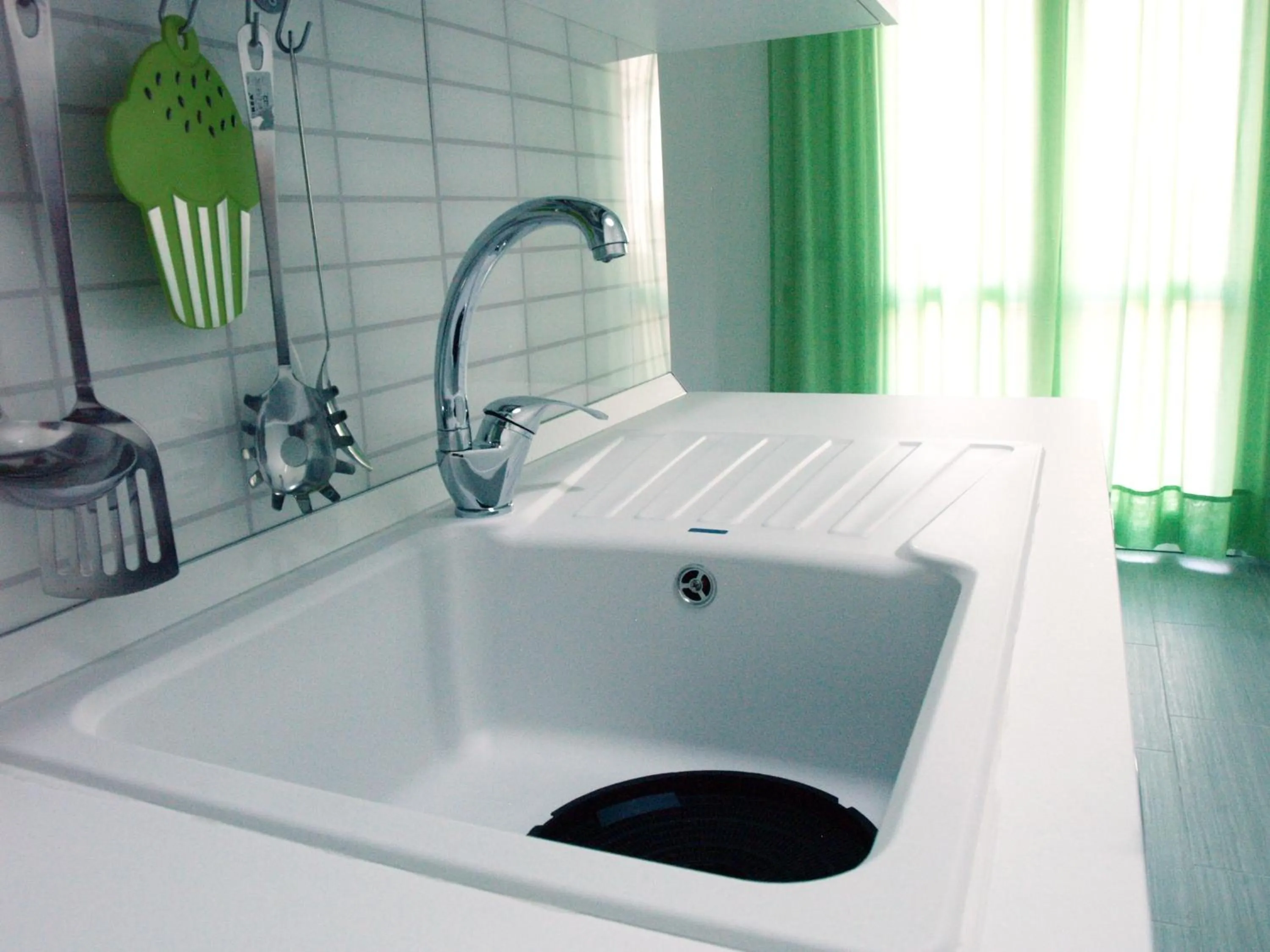 Kitchen or kitchenette in Residence Le Isole