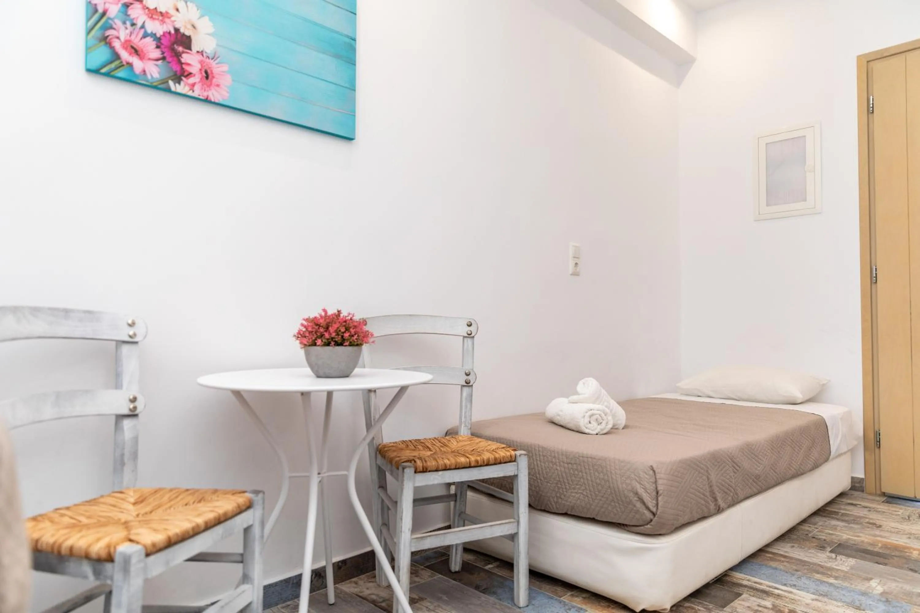 Dining area, Bed in Depis luxury suites