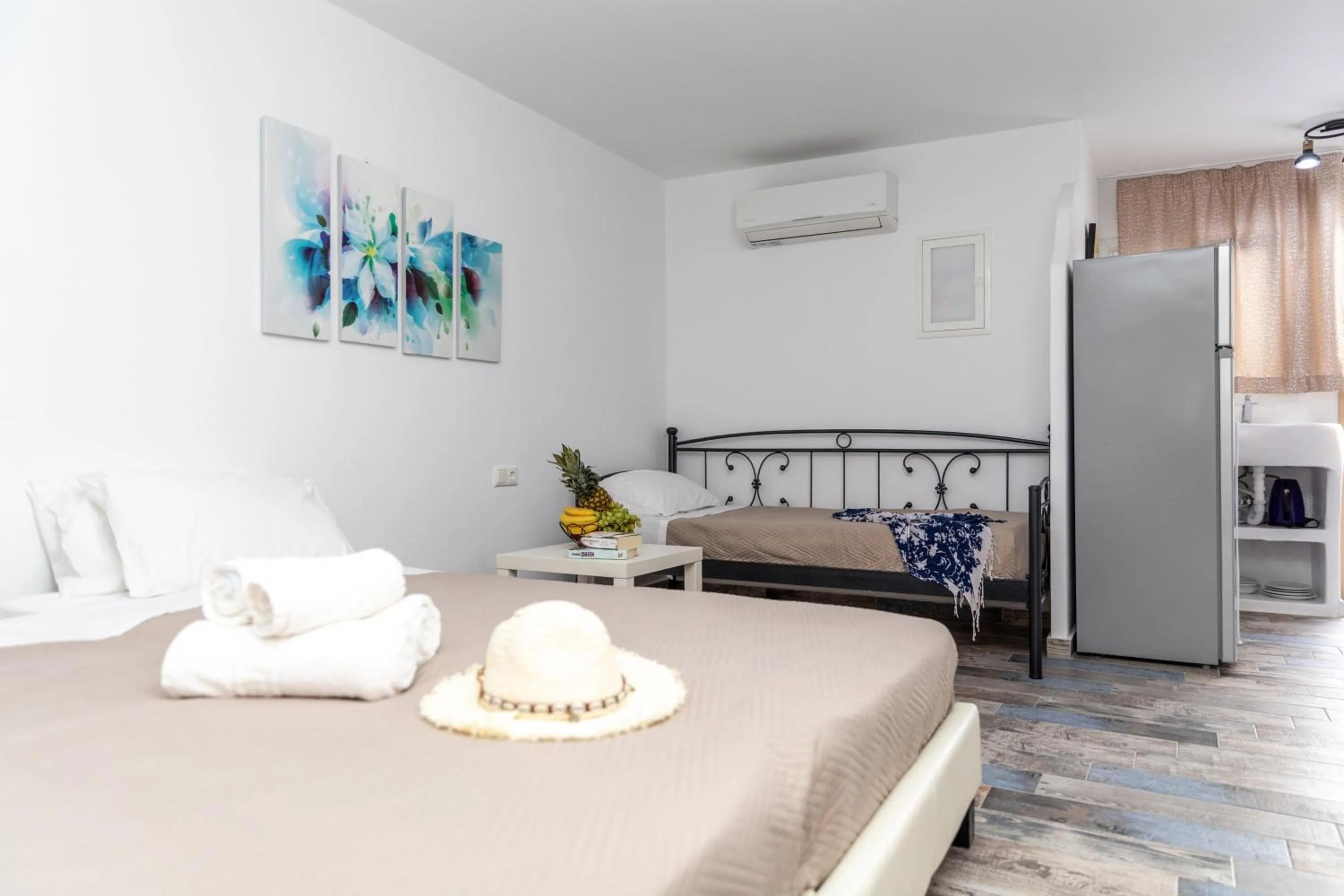 Seating area, Bed in Depis luxury suites