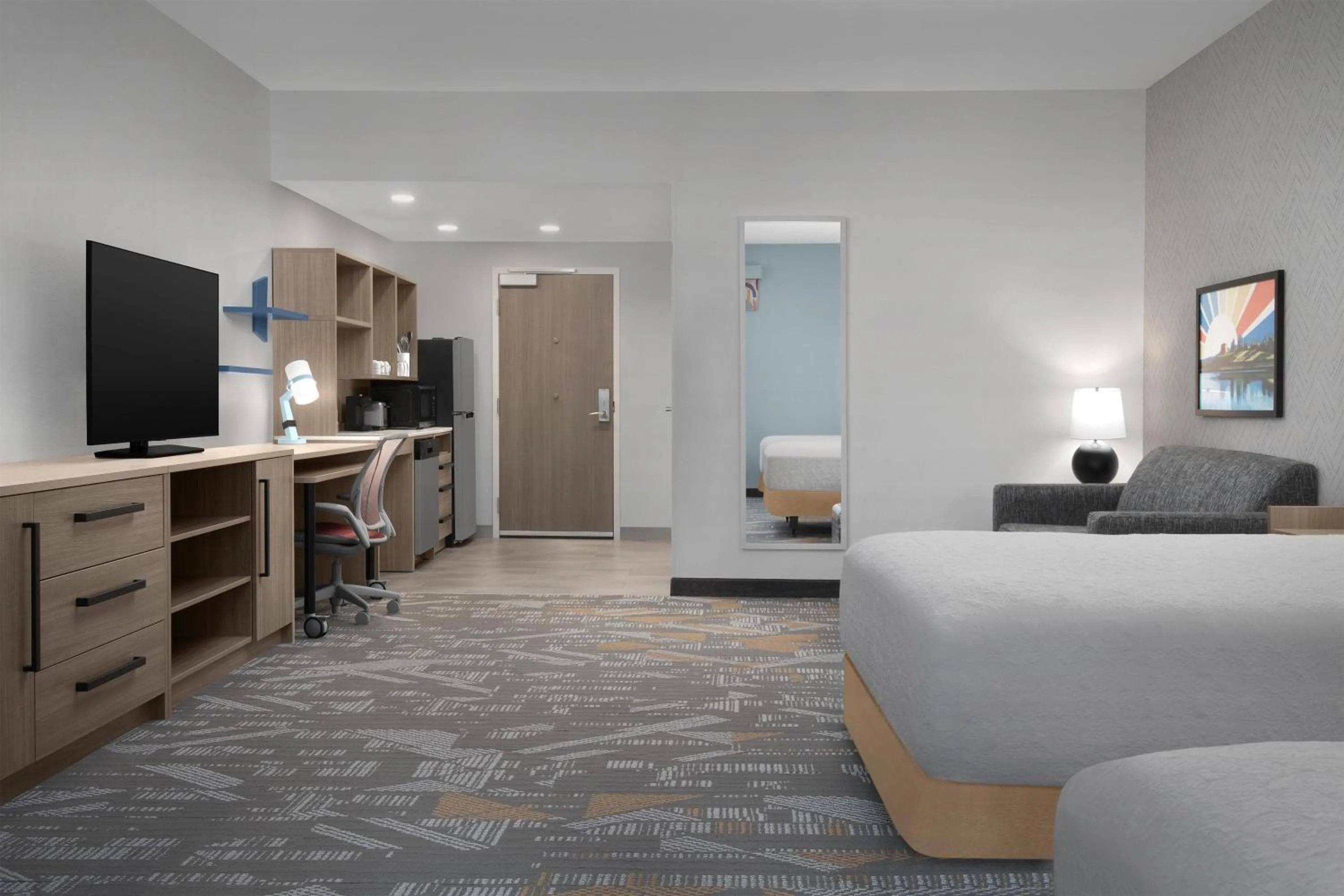 Living room, Bed in Home2 Suites By Hilton Syracuse Liverpool Airport Area