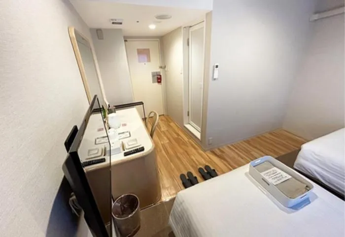 Bed in Quintessa Hotel Akita