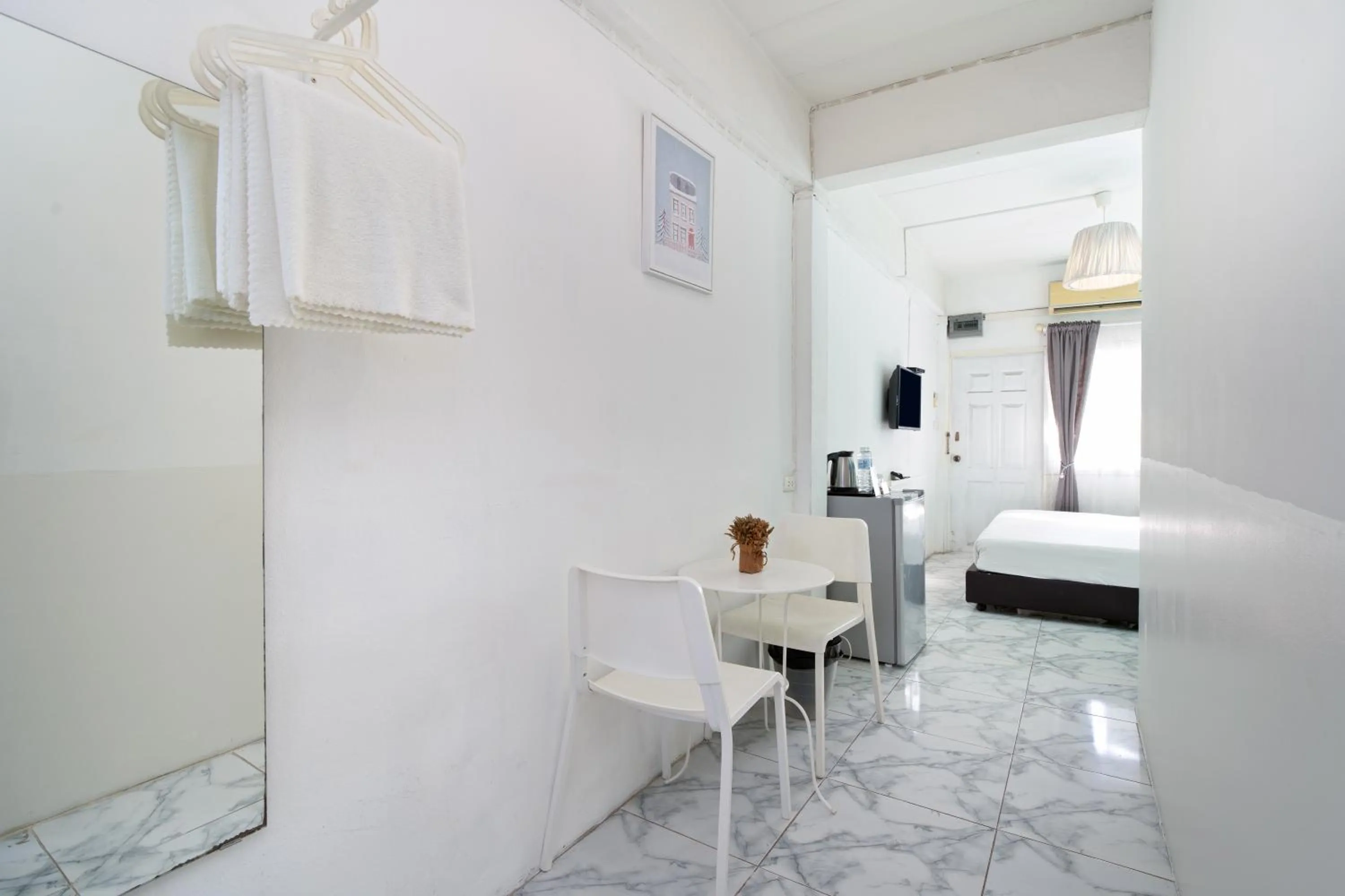 Seating area, Bed in Take a Rest Donmueang