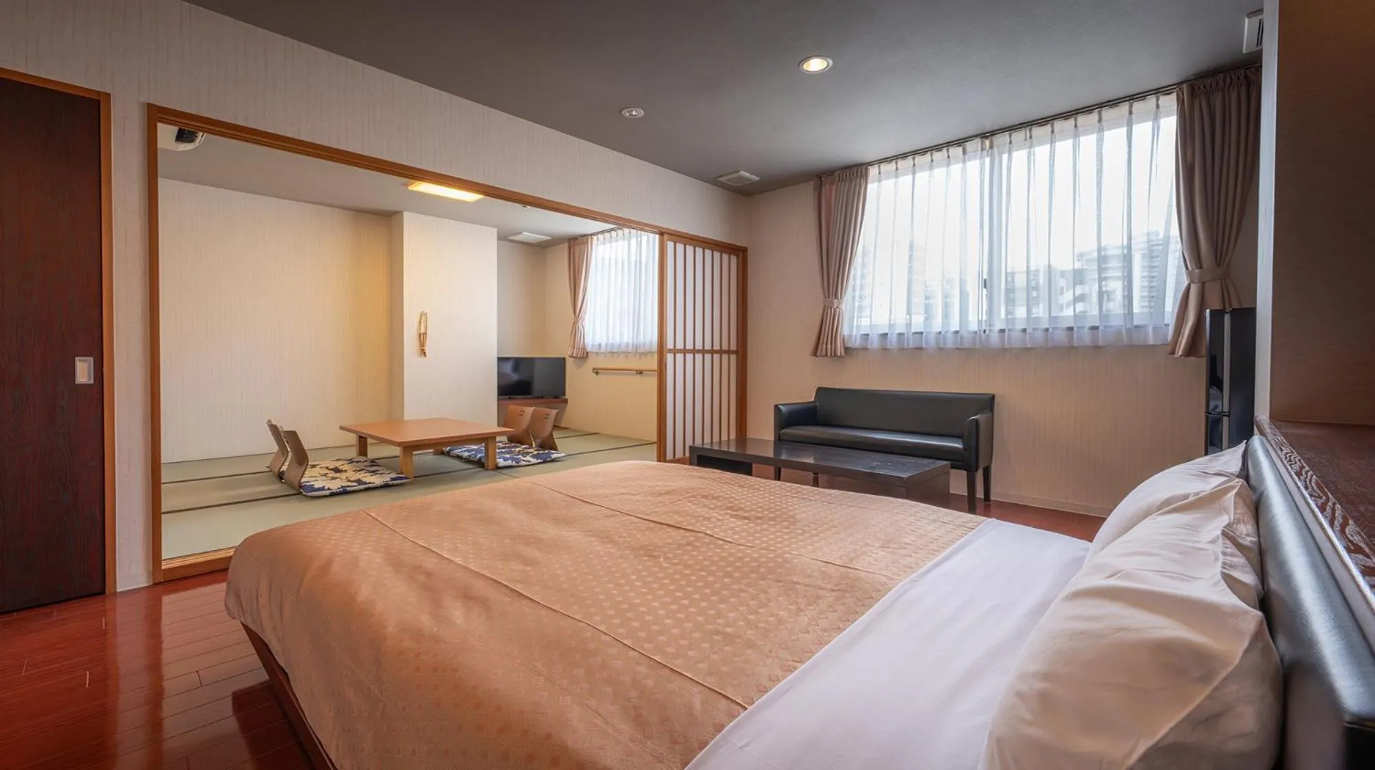Photo of the whole room, Bed in Quintessa Hotel Fukuoka watanabedori Comic&Books
