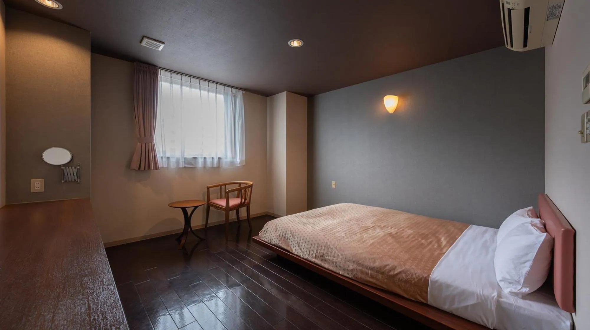 Photo of the whole room, Bed in Quintessa Hotel Fukuoka watanabedori Comic&Books