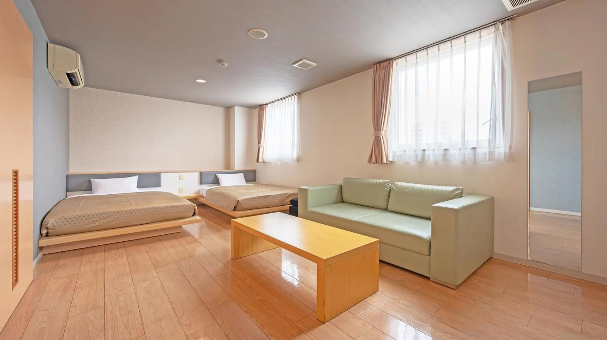 Photo of the whole room, Bed in Quintessa Hotel Fukuoka watanabedori Comic&Books