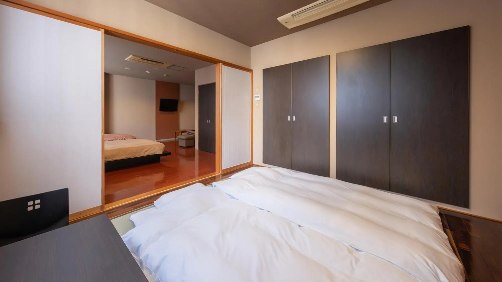 Bedroom, Bed in Quintessa Hotel Fukuoka watanabedori Comic&Books