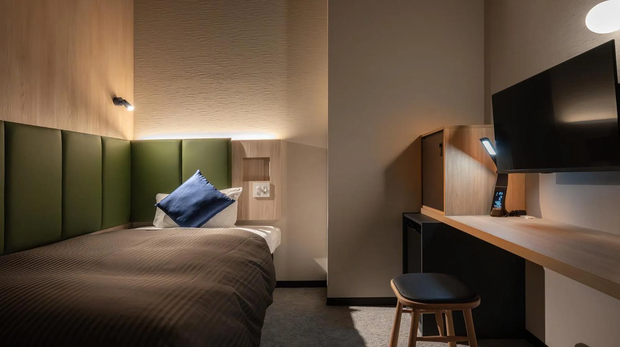 Photo of the whole room, Bed in Quintessa Hotel Fukuoka watanabedori Comic&Books