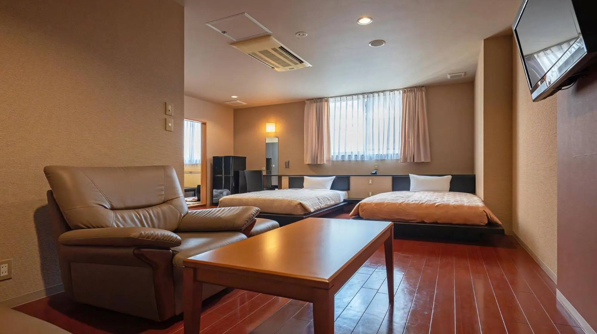 Photo of the whole room, Bed in Quintessa Hotel Fukuoka watanabedori Comic&Books
