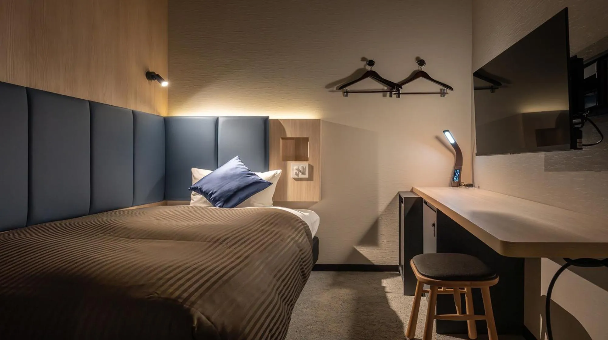 Photo of the whole room, Bed in Quintessa Hotel Fukuoka watanabedori Comic&Books