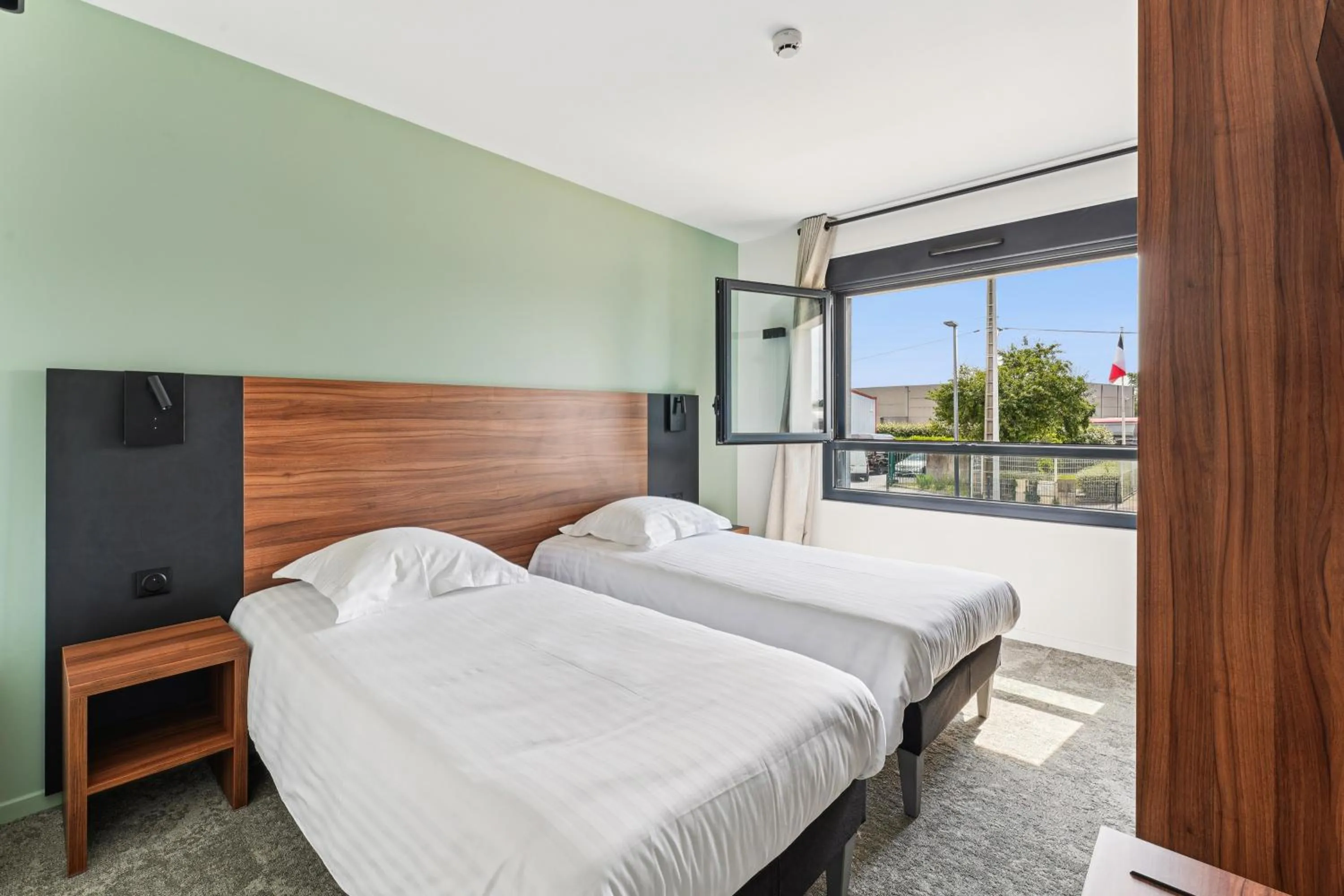 Bed in Hôtel Akena Pierrelaye