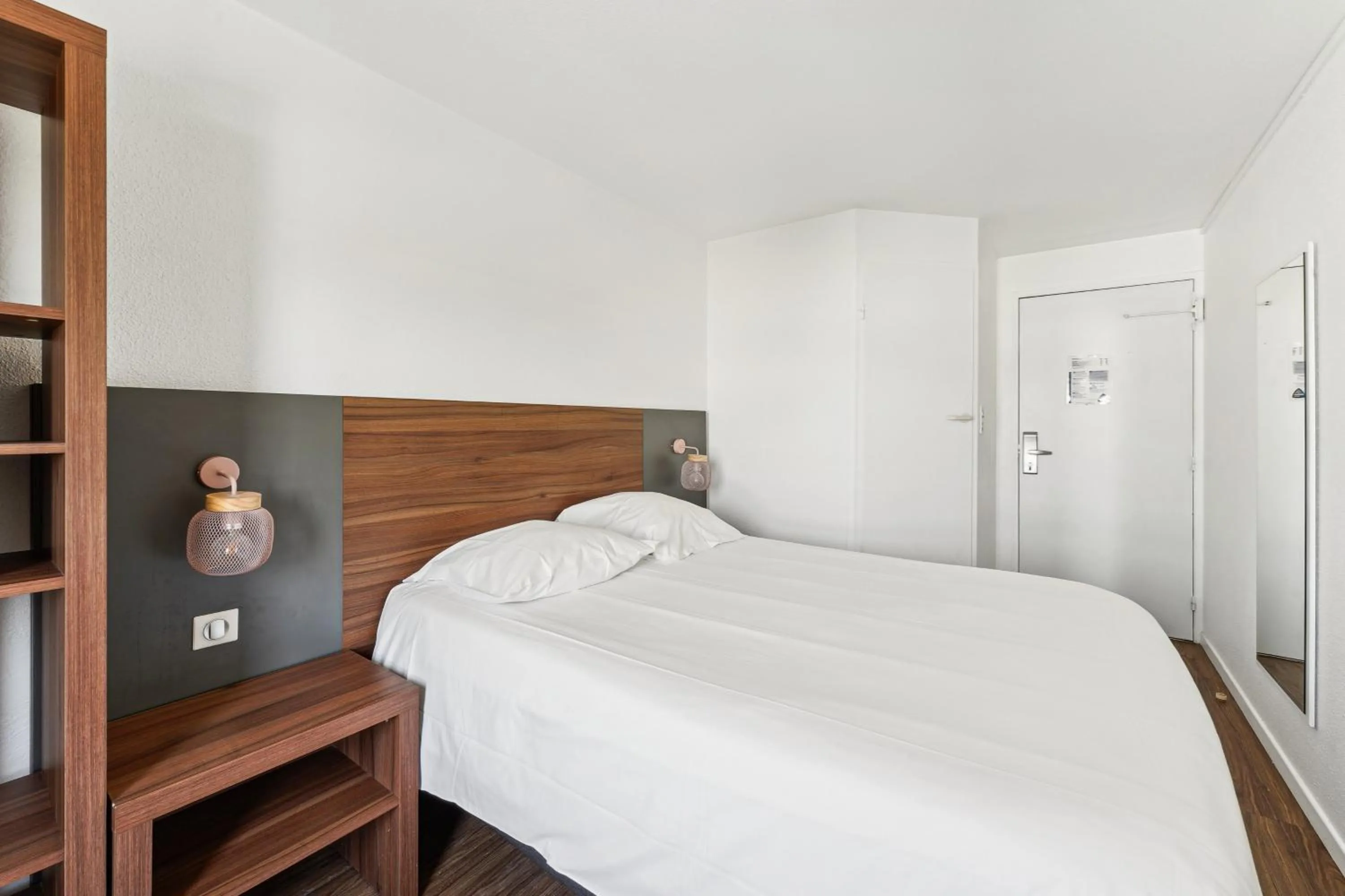 Bed in Hôtel Akena Pierrelaye