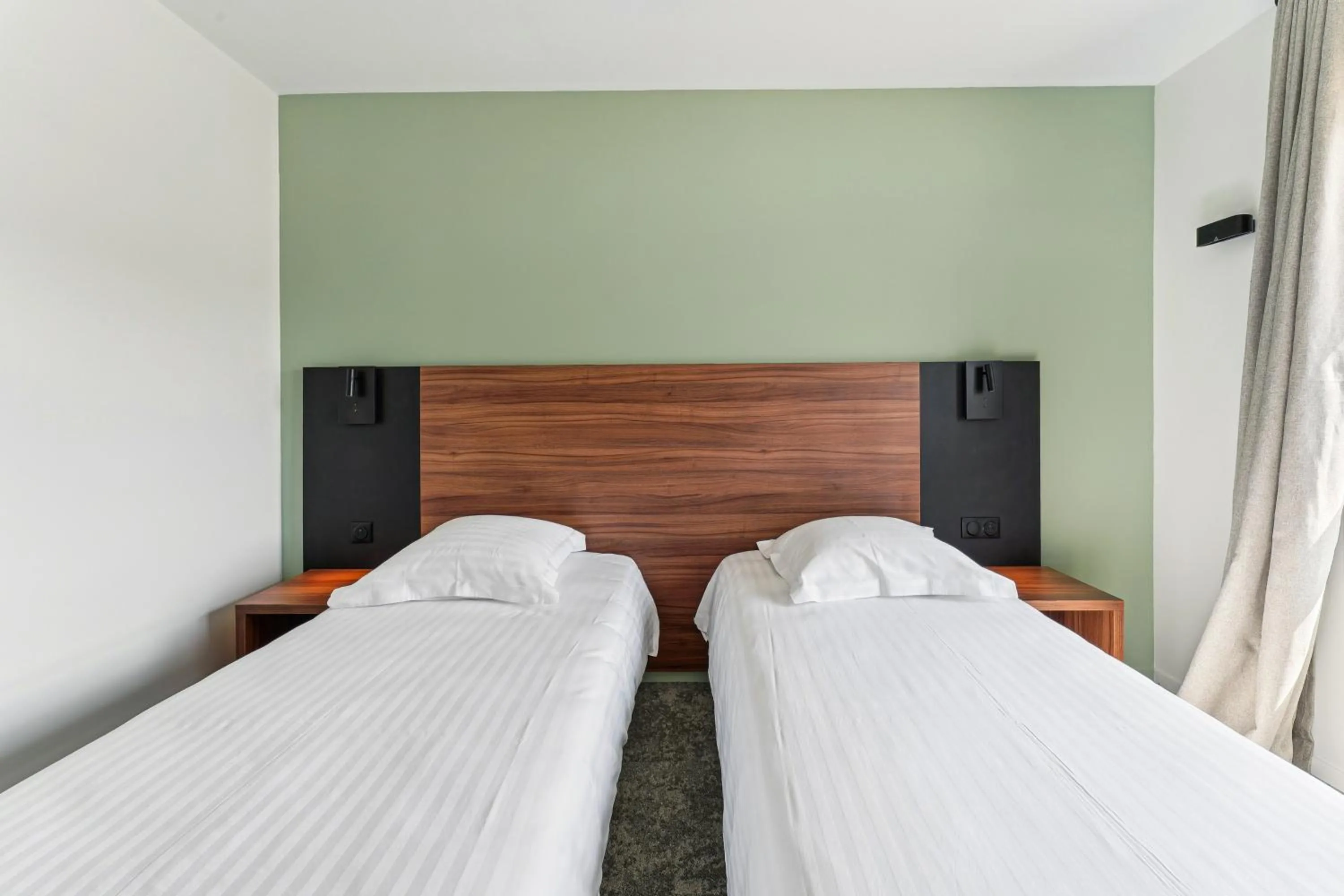 Photo of the whole room, Bed in Hôtel Akena Pierrelaye