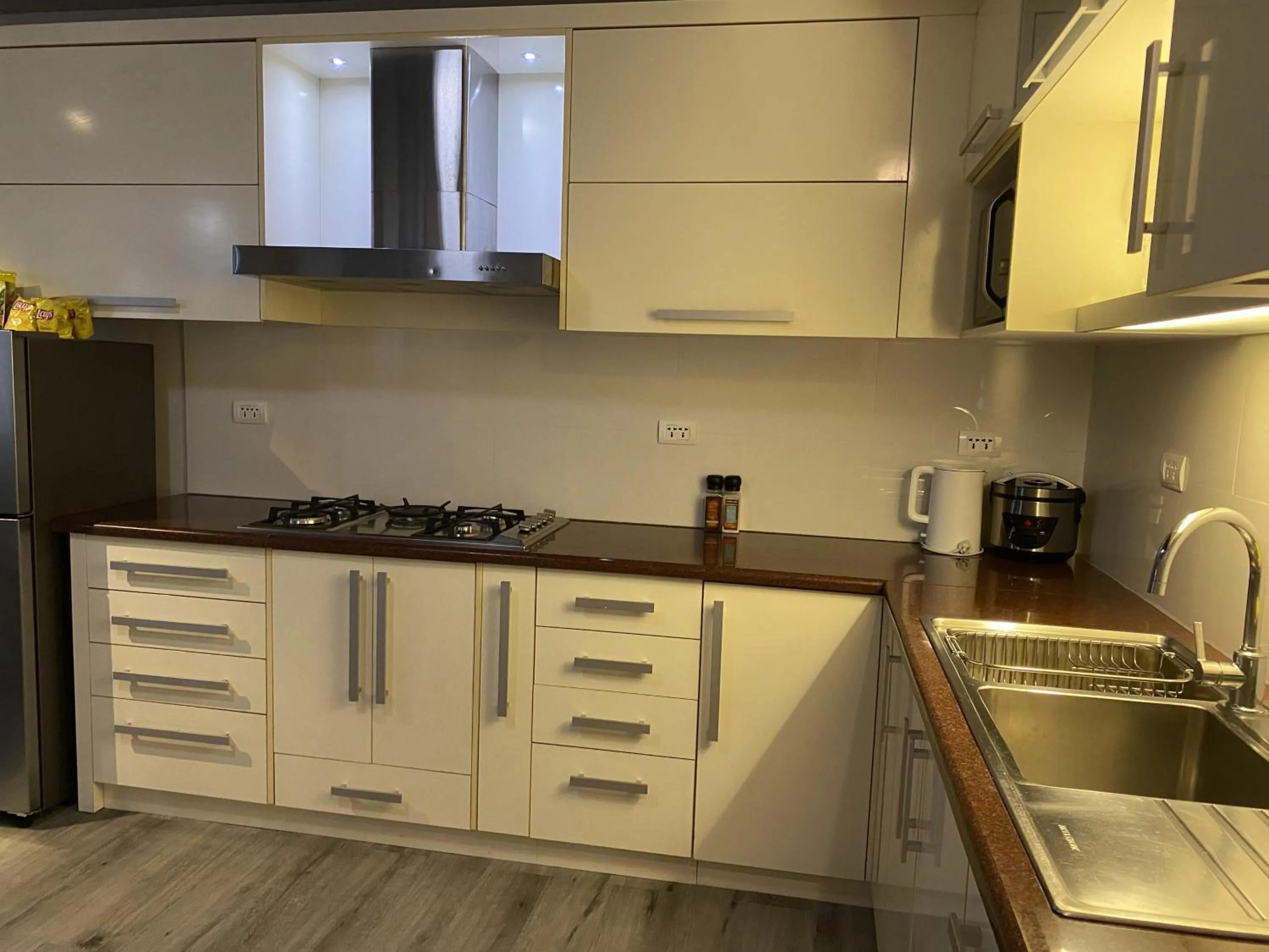 kitchen in Lalaguna Villas Luxury Dive Resort and Spa