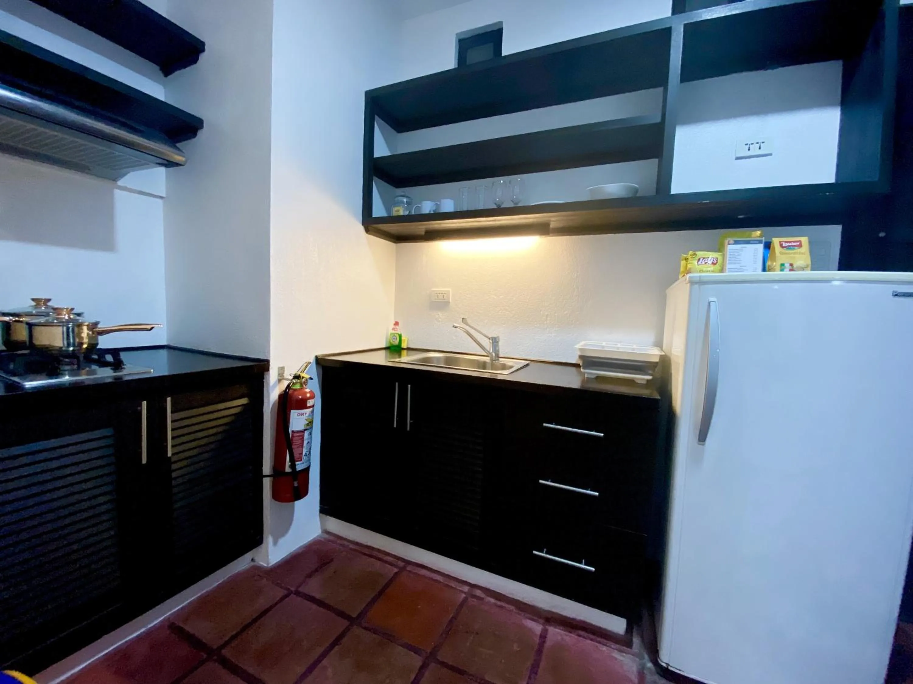 kitchen in Lalaguna Villas Luxury Dive Resort and Spa