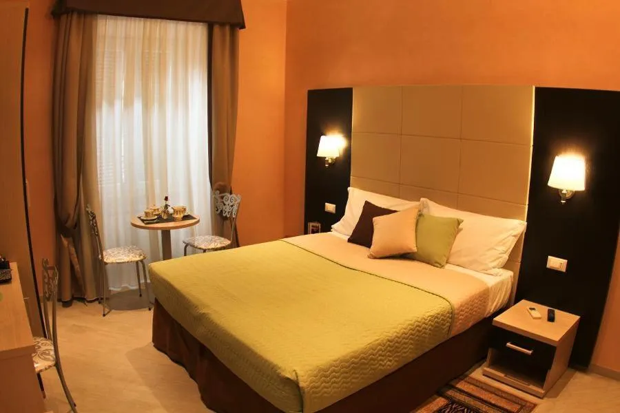 Bed in Candia Inn Vatican