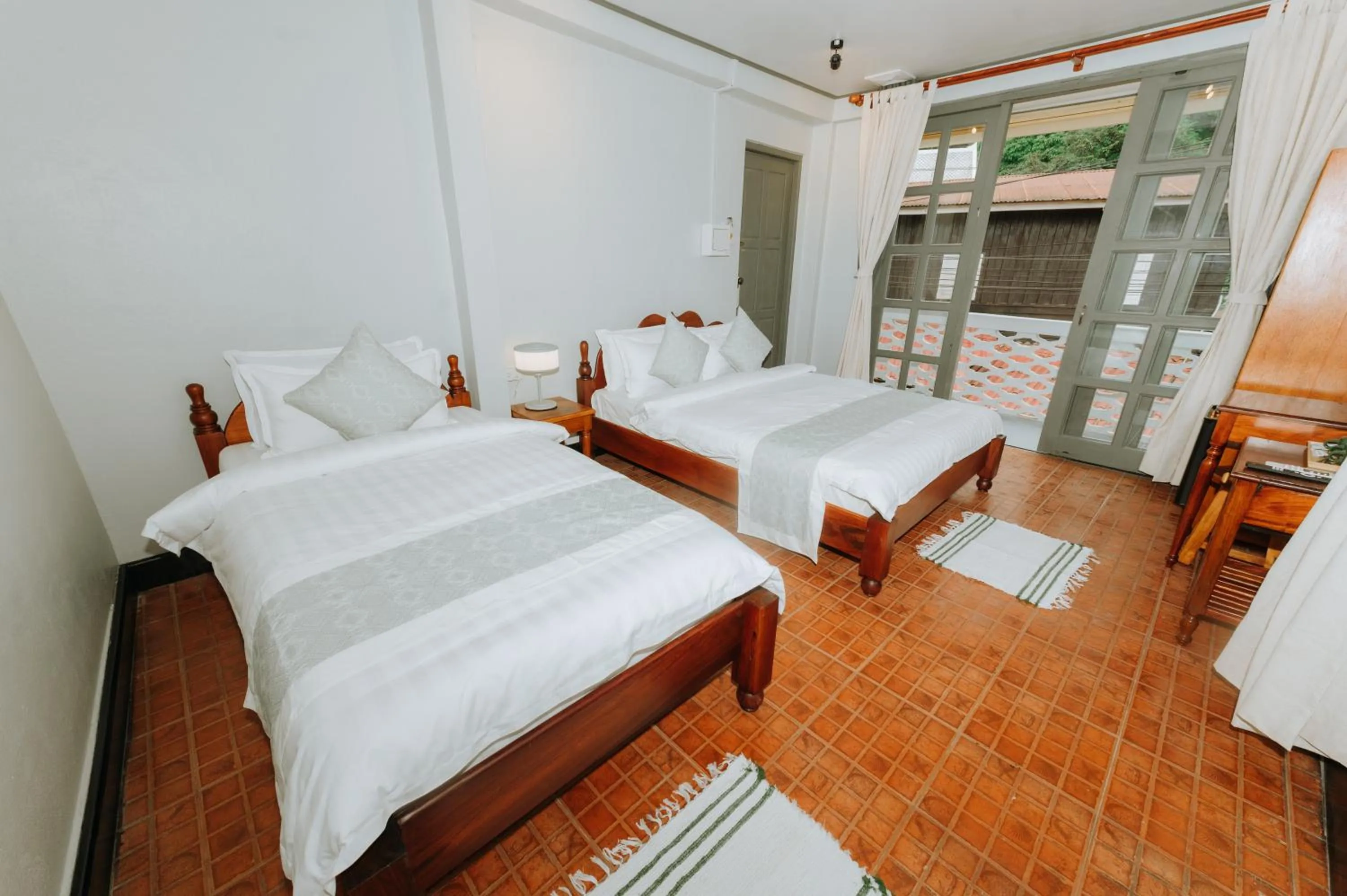 Bed in SamaiLaos Residence