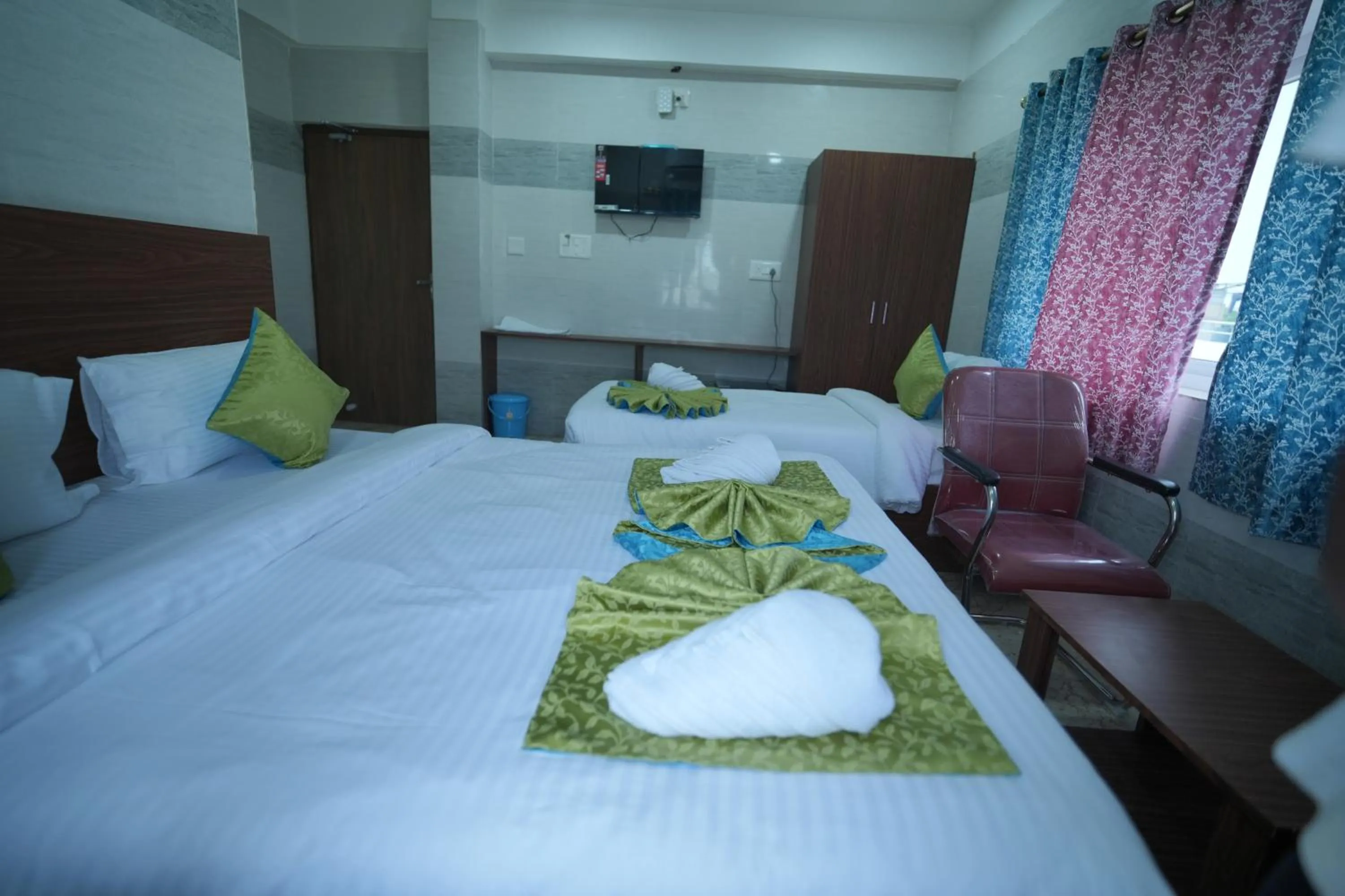 Bed in Hotel Mirka Plaza