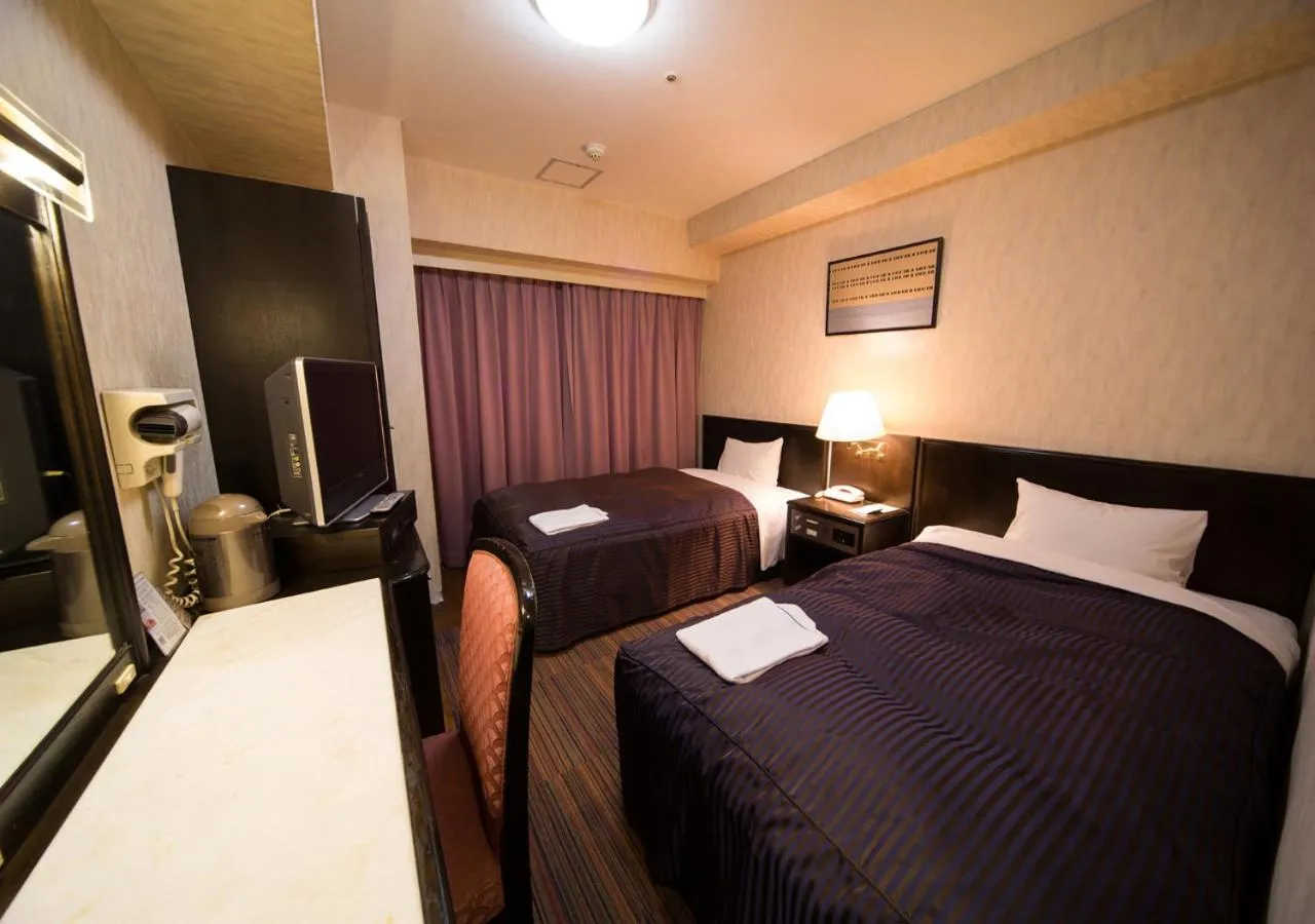 Bedroom, Bed in Hotel Claiton Esaka