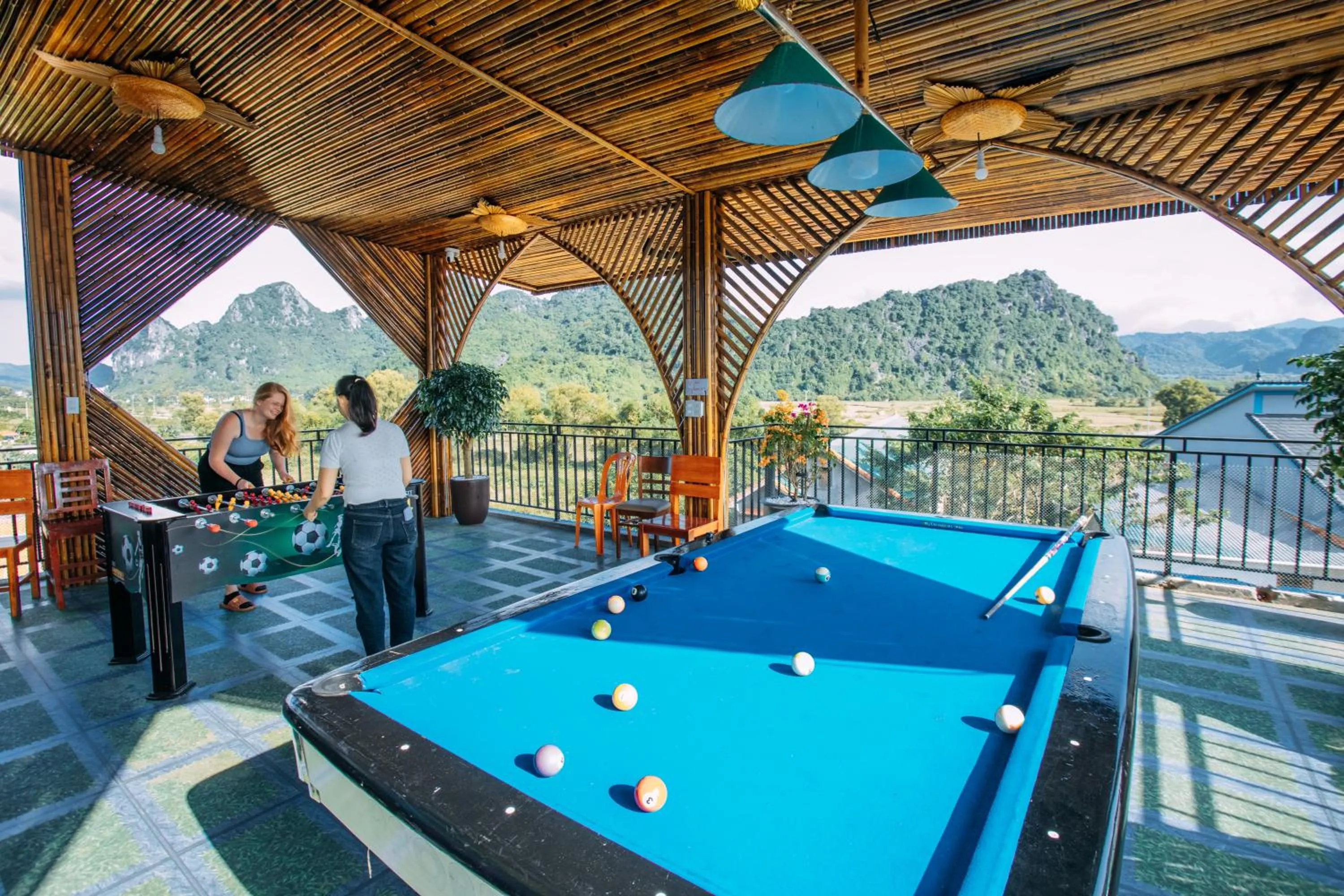 People in Green Riverside Cosy Home