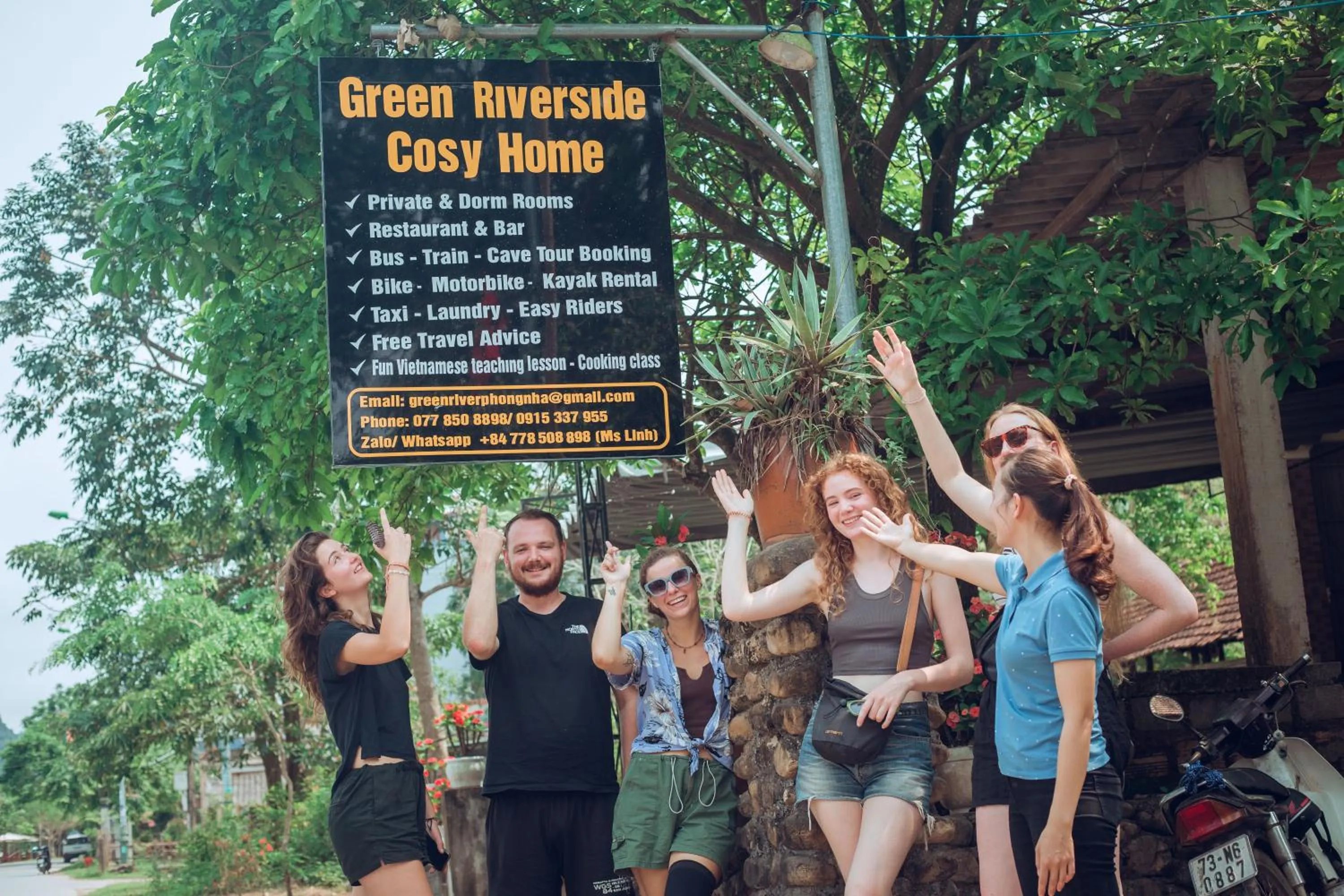 People in Green Riverside Cosy Home