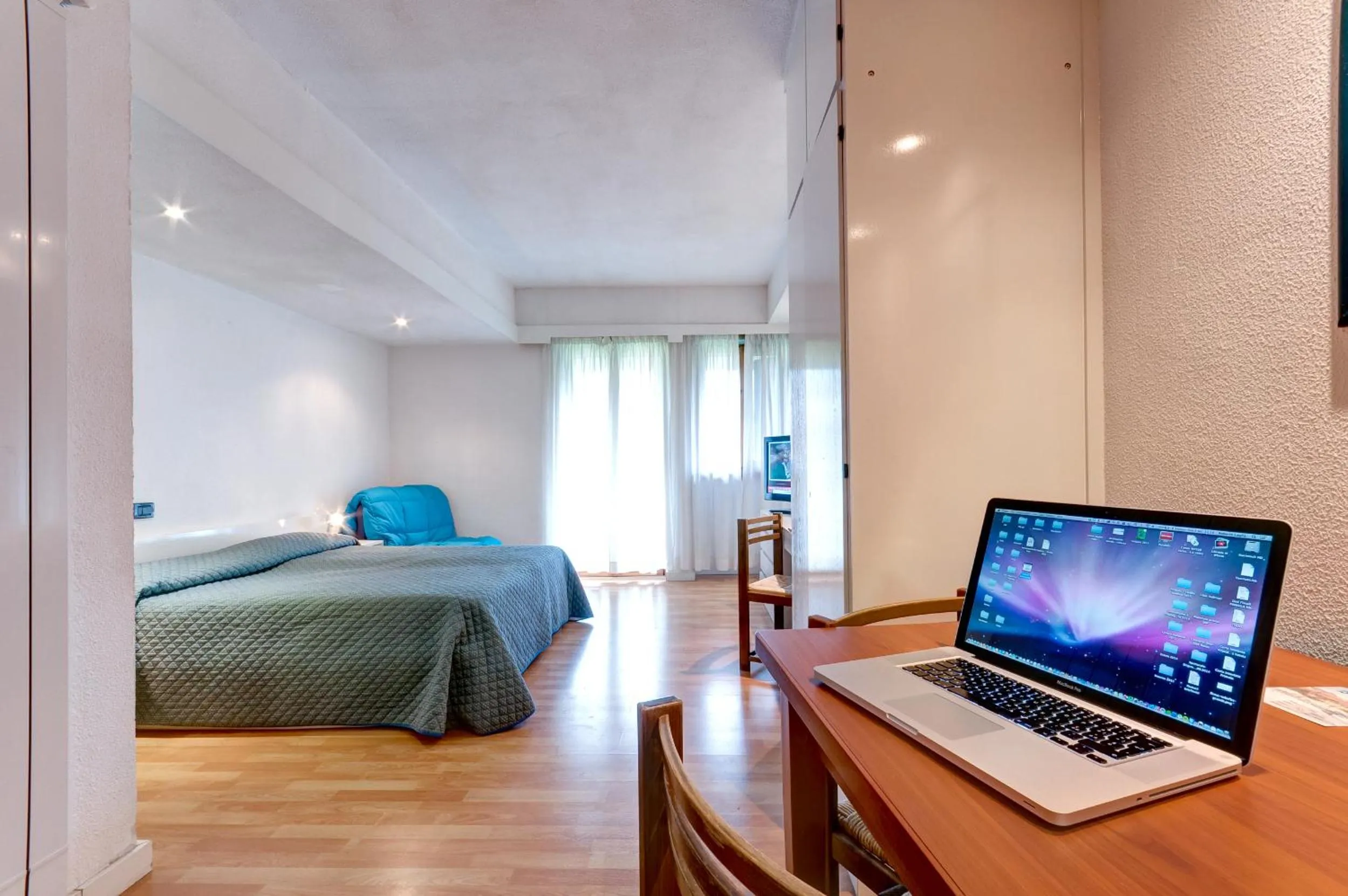 Seating area, Bed in Hotel Residence Club Primula