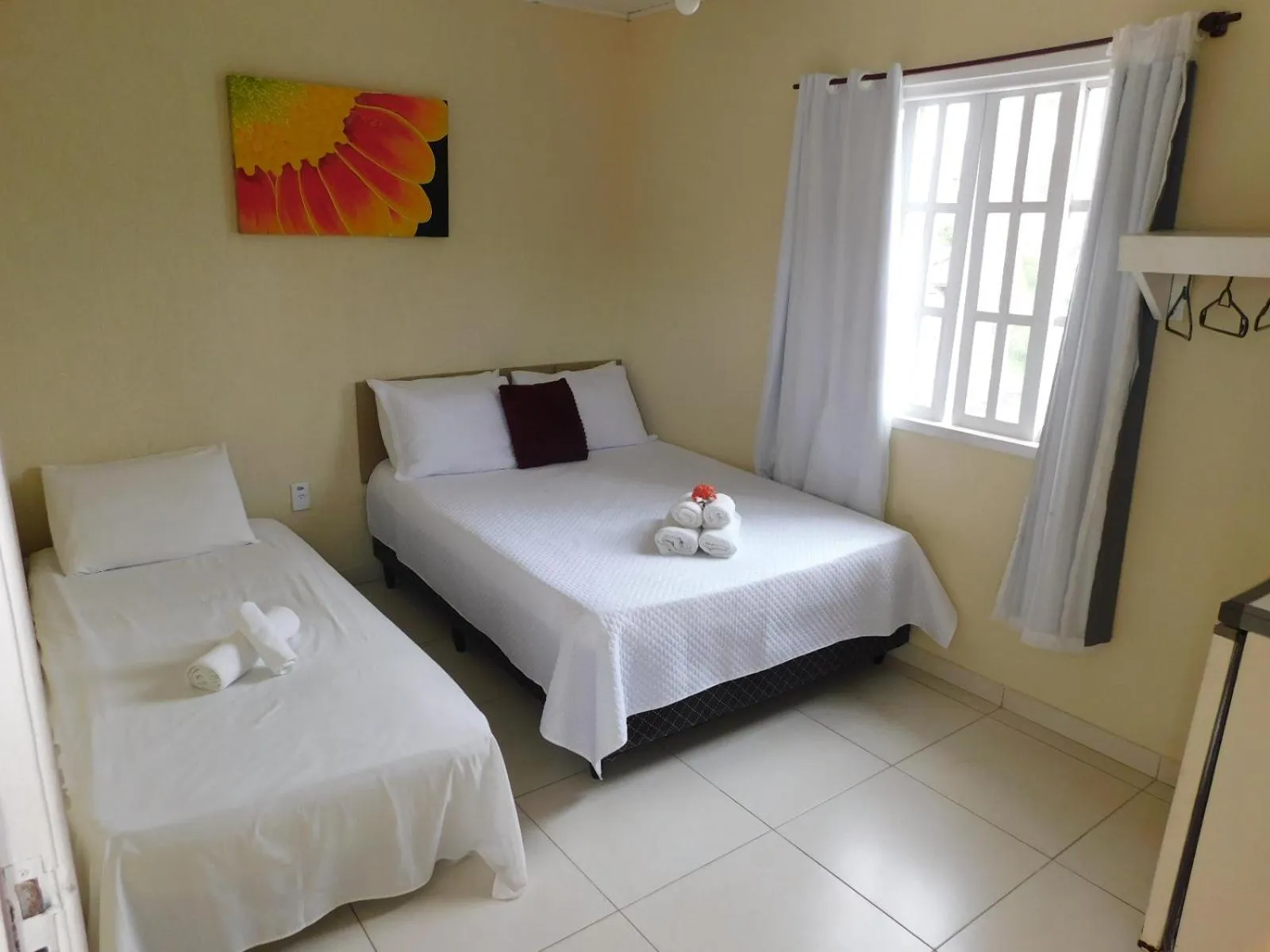 Photo of the whole room, Bed in Pousada Luzes de Geribá