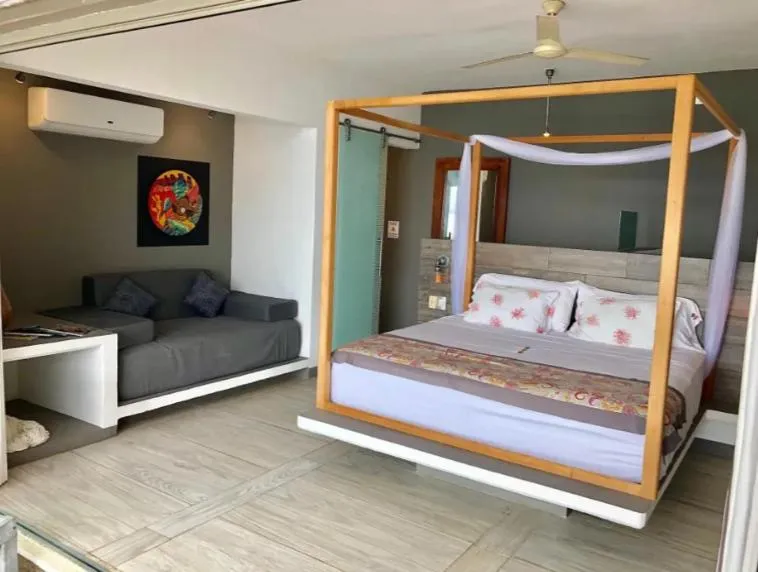 Bed in Villa Aikia (Adults Suites A/C)