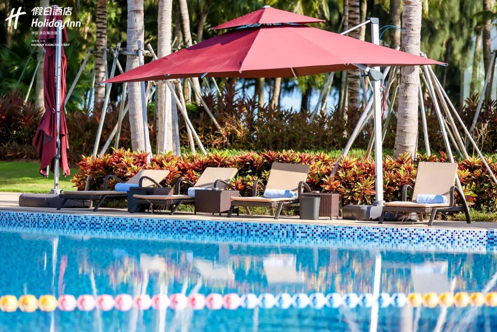 Swimming pool in Holiday Inn Hainan Xiangshui Bay by IHG