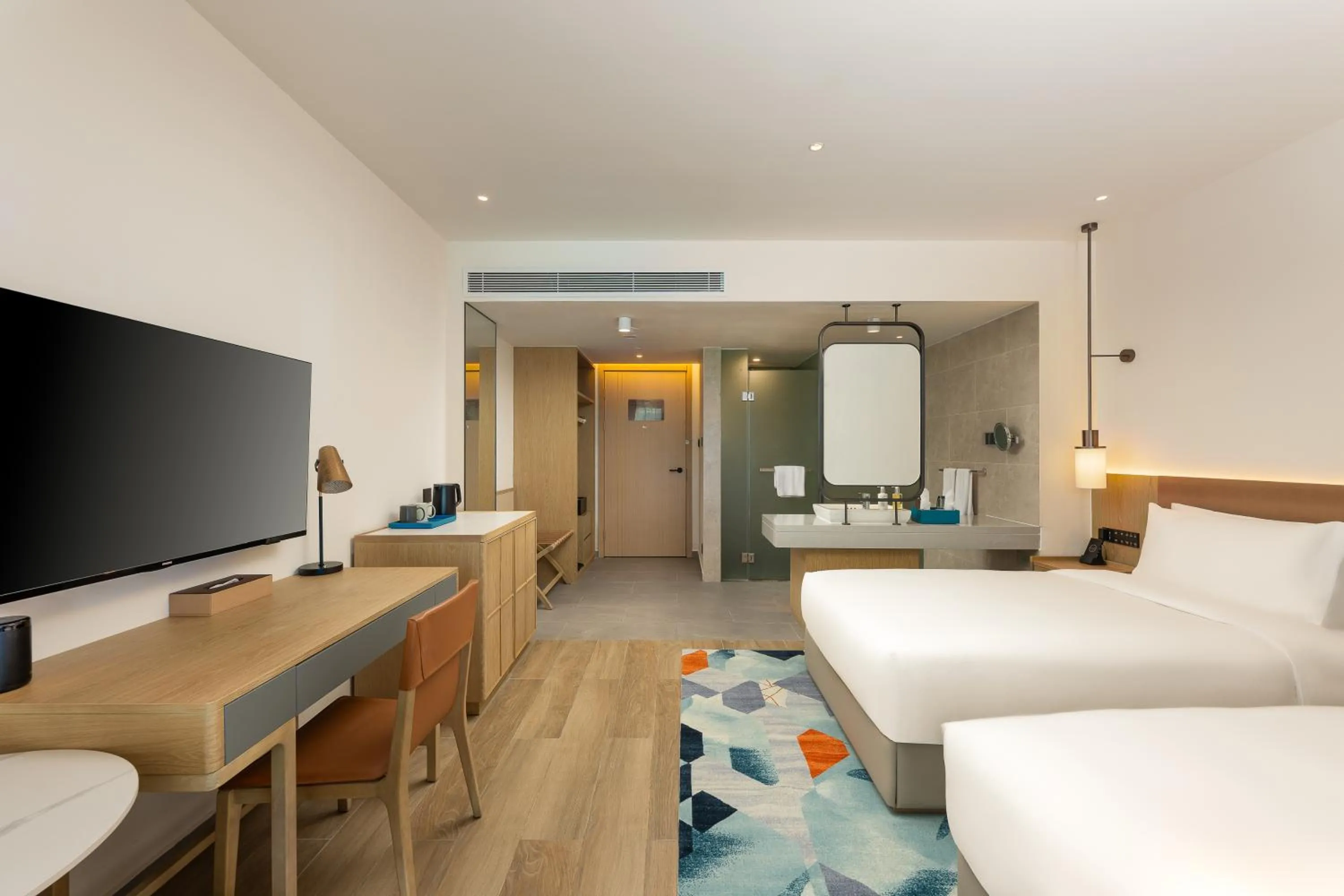 Communal lounge/ TV room in Holiday Inn Hainan Xiangshui Bay by IHG