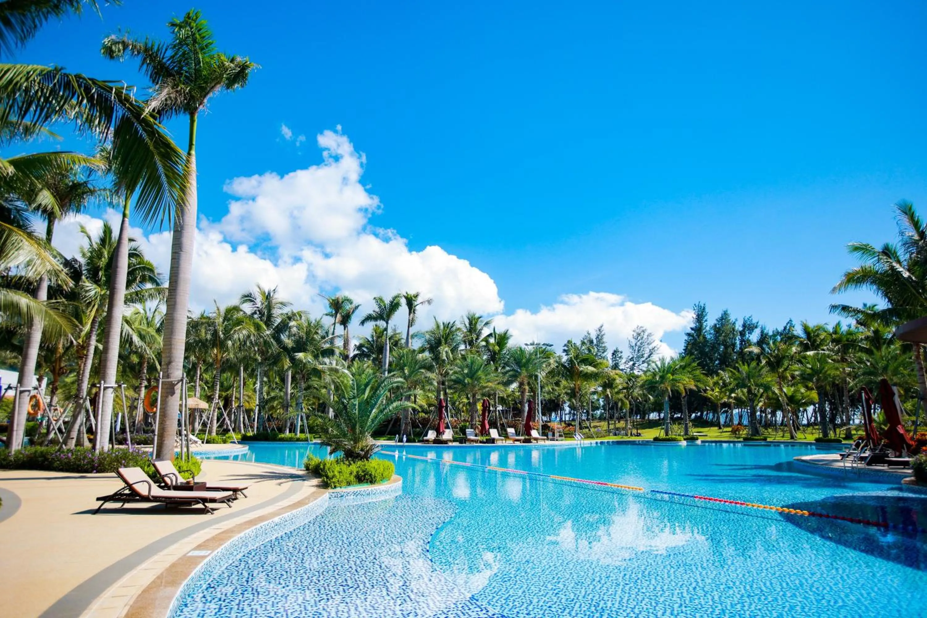 Swimming pool in Holiday Inn Hainan Xiangshui Bay by IHG