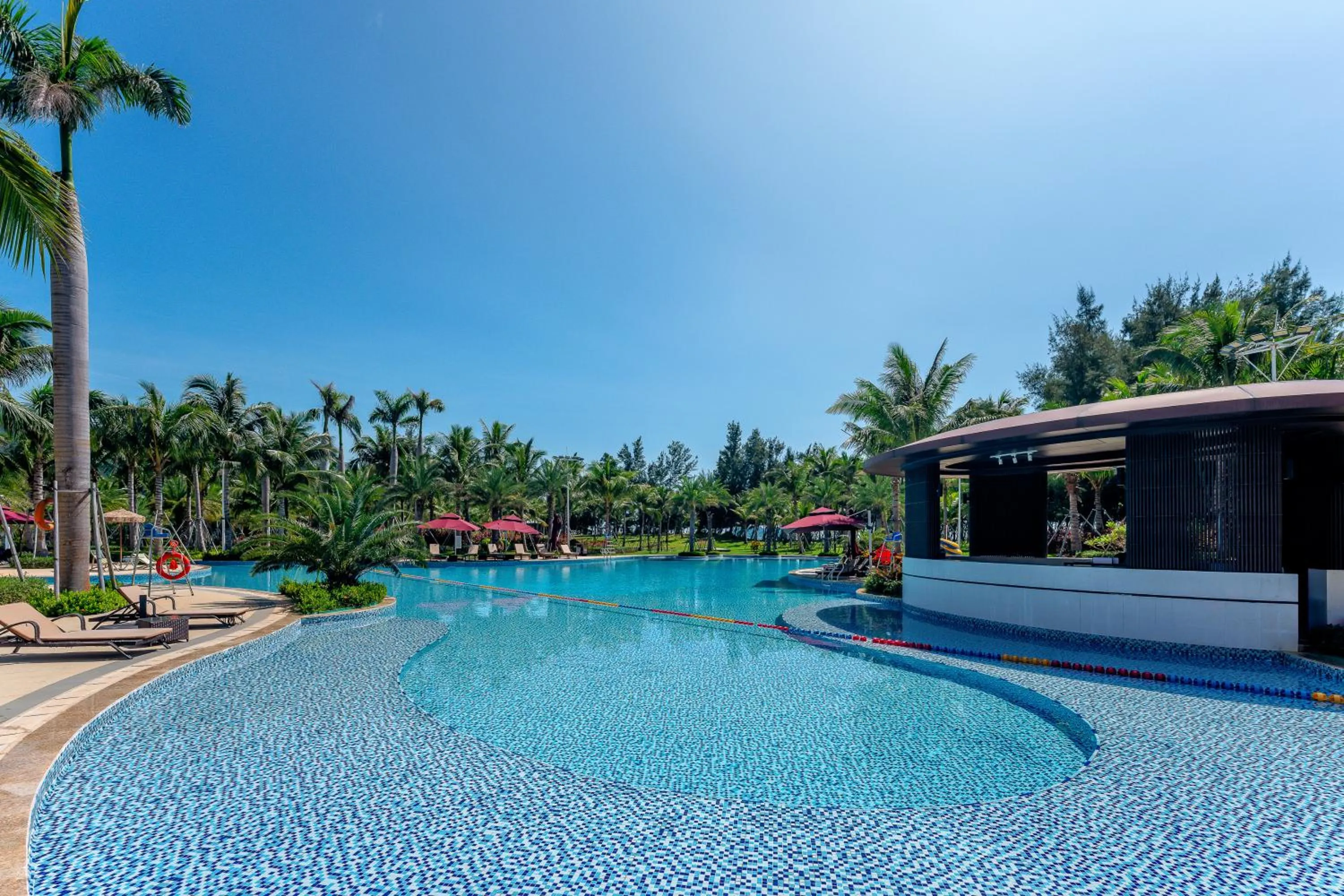 Swimming pool in Holiday Inn Hainan Xiangshui Bay by IHG