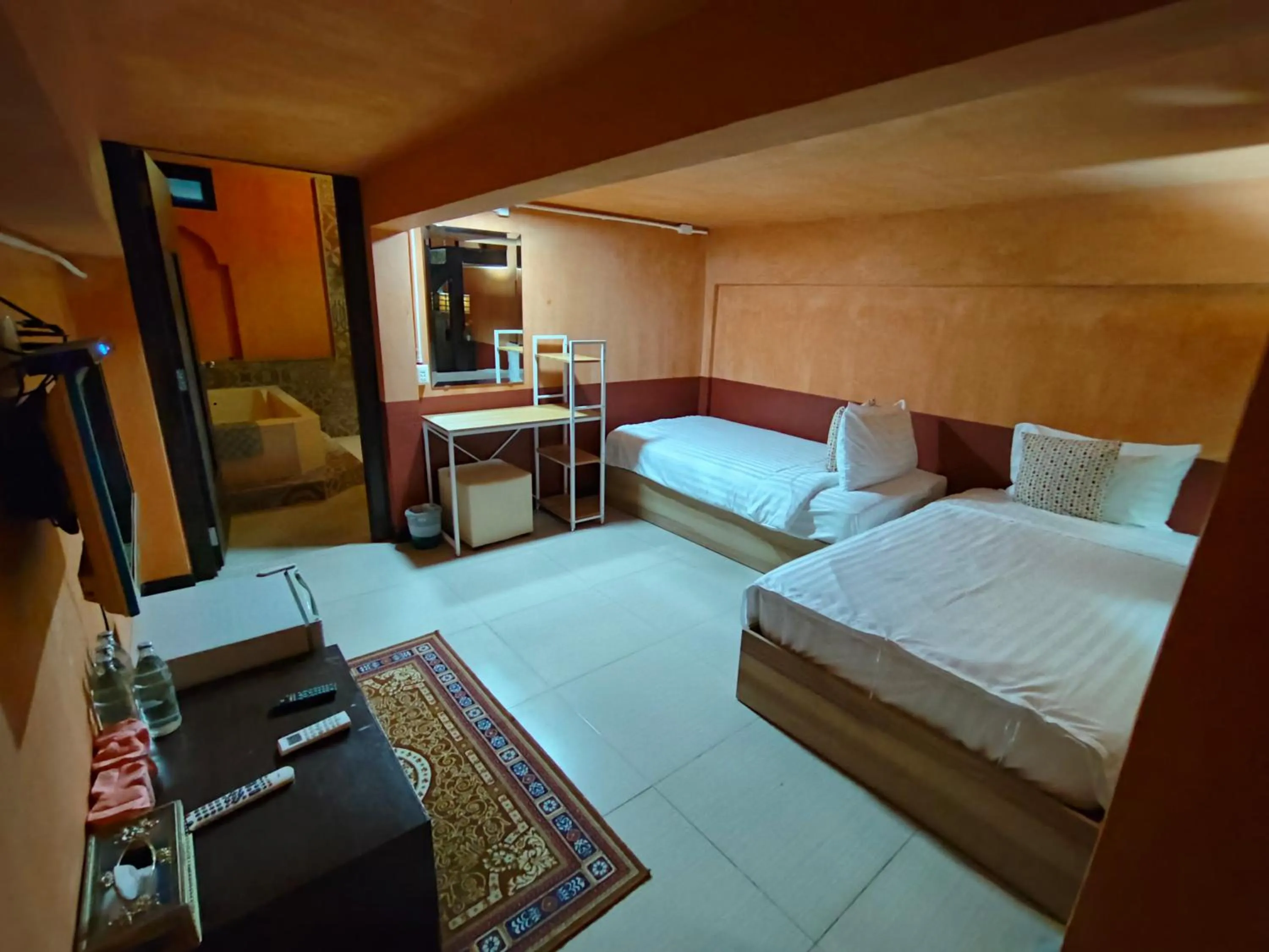 Bed in Retro Box Hotel Chumphon