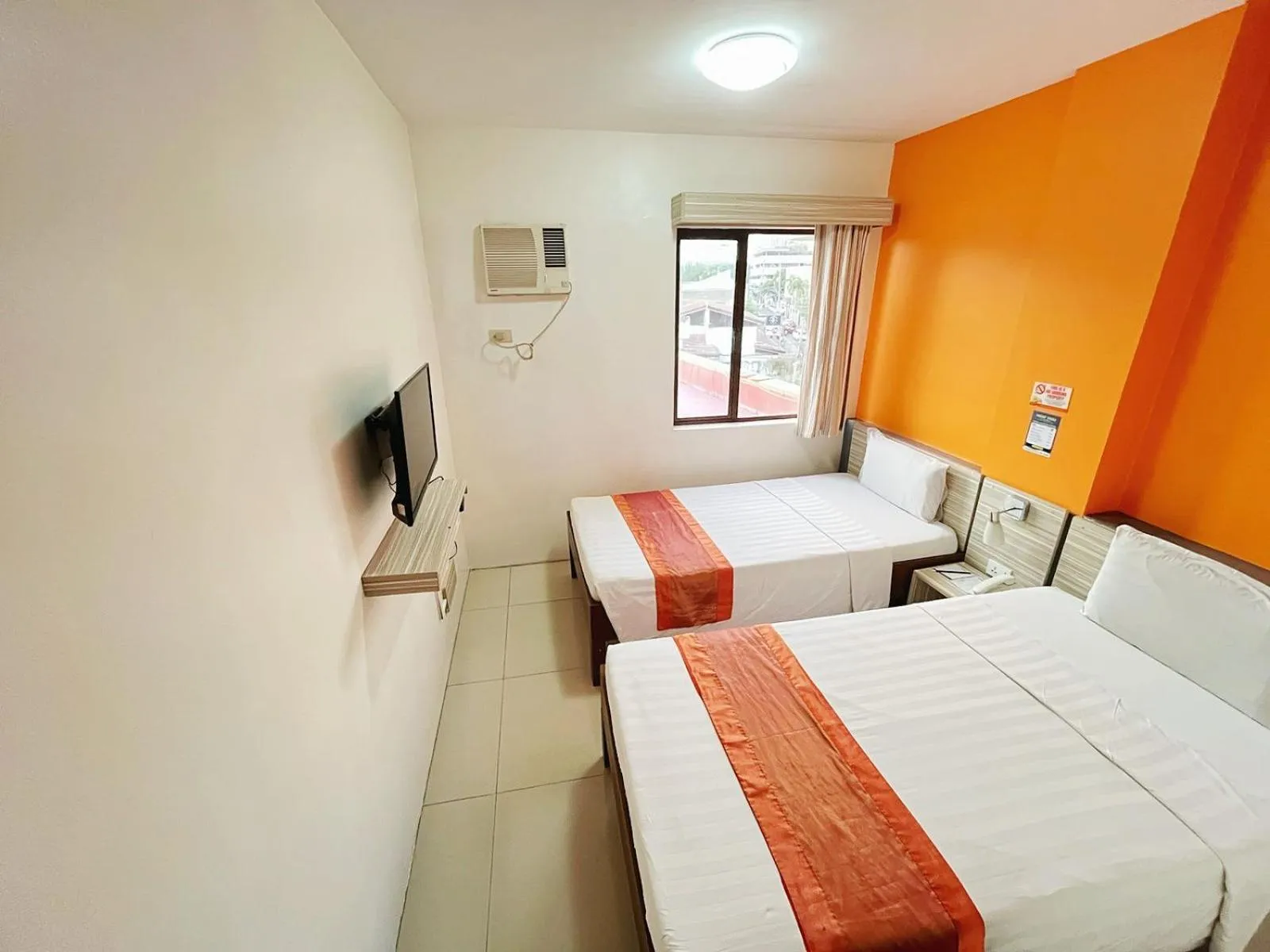 Bedroom in Travelbee Business Inn