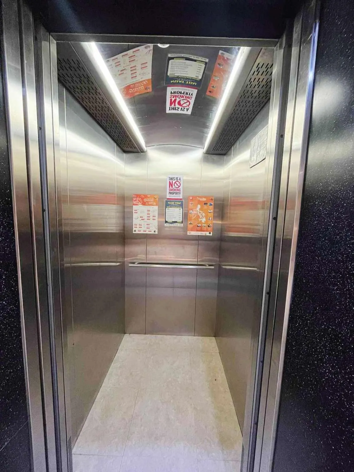 elevator in Travelbee Business Inn