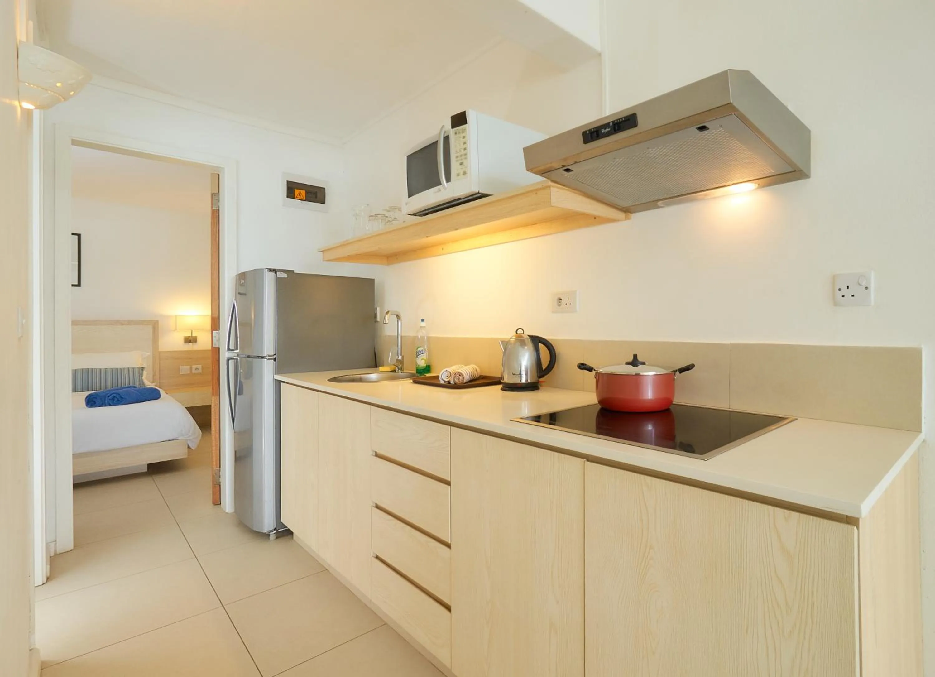 Kitchen or kitchenette, Bed in Le Beachclub